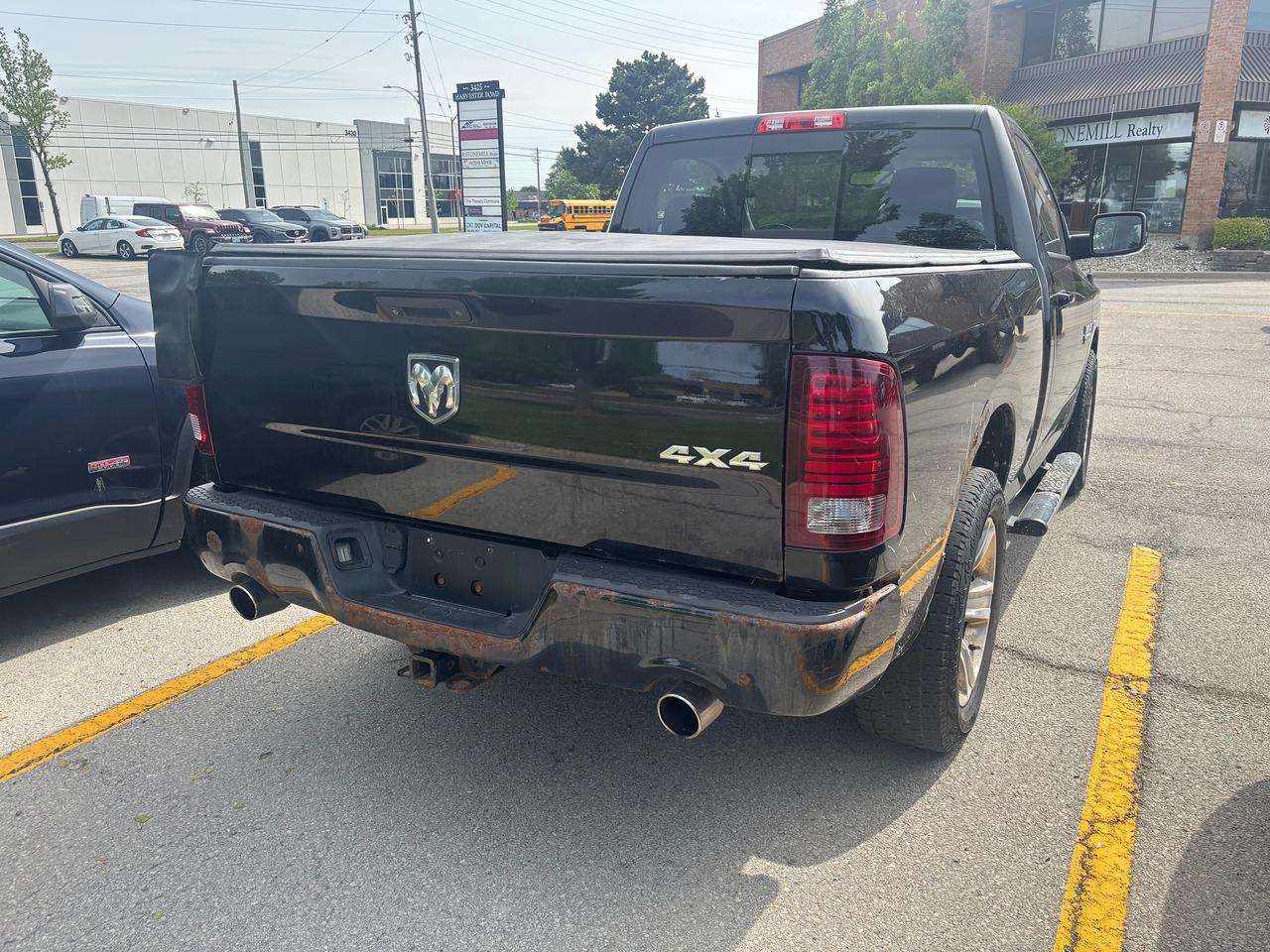 2015 RAM 1500 4WD REG CAB 120.5" SPORT Photo3