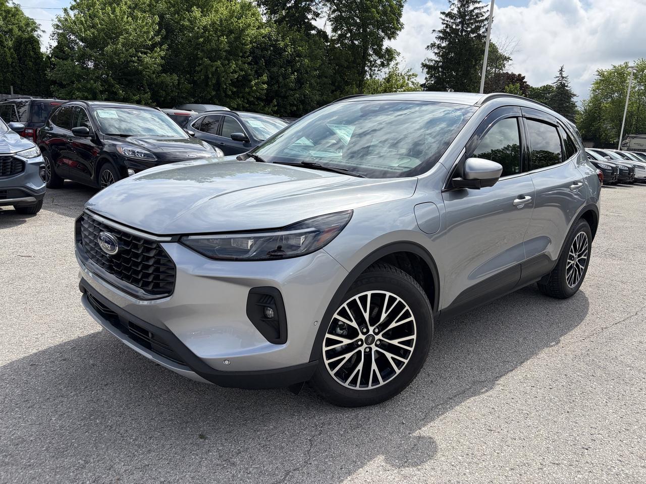 <p>Discover the future of driving with this exceptional used 2024 Ford Escape PHEV FWD, now available at Winegard Ford. This versatile SUV/Crossover is designed for the modern Canadian driver, offering an intelligent blend of efficiency and capability. With only 32,974 kilometers on the odometer, this Escape PHEV is ready to embark on your next adventure, providing a smooth and responsive ride thanks to its front-wheel drive and advanced hybrid powertrain.</p><p>&nbsp;</p><p>Step inside and experience a cabin crafted for comfort and convenience. From the deep tinted glass and body-coloured accents to the intuitive driver information centre and voice-activated dual-zone automatic climate control, every detail has been considered. Whether youre navigating city streets or heading out on a weekend getaway, this 2024 Ford Escape PHEV FWD offers a refined driving experience thats both eco-conscious and exhilarating.</p><p>&nbsp;</p><p>Here are 5 features that truly make this 2024 Ford Escape PHEV FWD shine:</p><p><br><br></p><ul><li><strong>Plug-in Hybrid Electric Vehicle (PHEV) Technology:</strong> Experience the best of both worlds with impressive fuel efficiency and the ability to drive on electric power for shorter trips, reducing your carbon footprint and saving at the pump.</li></ul><p>&nbsp;</p><ul><li><strong>Adaptive Cruise Control with Stop-and-Go:</strong> Enjoy a more relaxed and safer drive, especially in traffic, as this advanced system automatically adjusts your speed to maintain a set distance from the vehicle ahead.</li></ul><p>&nbsp;</p><ul><li><strong>BLIS (Blind Spot Information System) with Cross-Traffic Alert:</strong> Drive with confidence knowing that this intelligent system monitors your blind spots and alerts you to approaching vehicles when backing out of a parking space.</li></ul><p>&nbsp;</p><ul><li><strong>Connected Navigation with Voice Activation:</strong> Never lose your way again with the integrated navigation system that responds to your voice commands, making it easier than ever to find your destination.</li></ul><p>&nbsp;</p><ul><li><strong>Heated Leatherette Steering Wheel:</strong> Conquer those chilly Canadian mornings with the luxurious comfort of a heated steering wheel, adding a touch of premium warmth to every drive.</li></ul><p><br><br></p><p><strong><em>Powered by AutoIntelligence&trade;</em></strong></p><p>&nbsp;</p><p>Vehicle information has been generated using artificial intelligence and is provided for informational purposes only. While efforts are made to ensure accuracy, please confirm all details directly with the dealer.</p><p>&nbsp;</p>