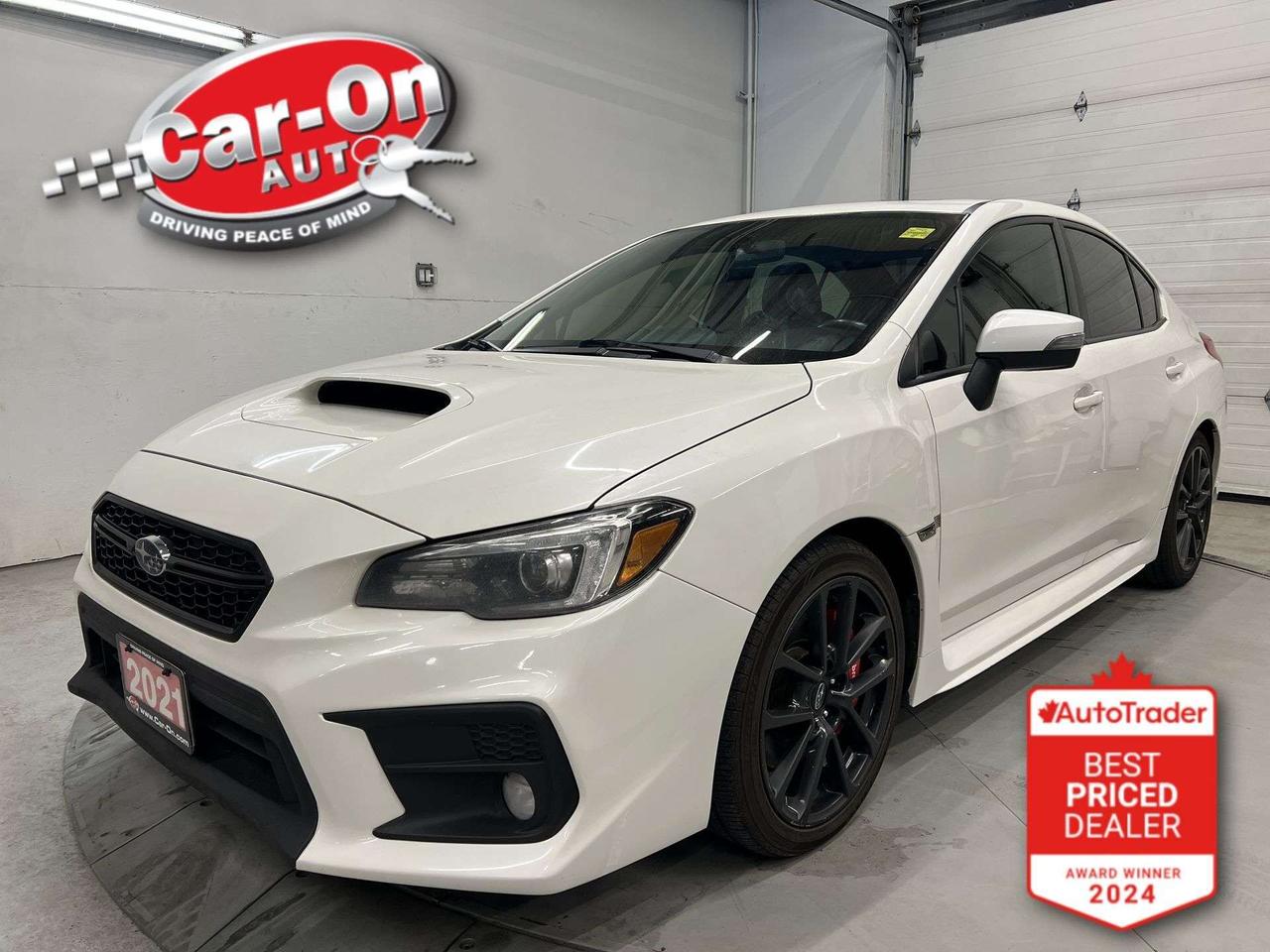 TOP OF THE LINE  6-SPEED MANUAL SPORT-TECH ALL-WHEEL DRIVE W/ 268HP 2.0L TURBO!!! Leather, sunroof, heated seats, Android Auto/ Apple CarPlay, navigation, 18-inch black alloys, backup camera, premium Harman/ Kardon audio system, Brembo performance brakes, automatic climate control, keyless entry w/ push start, power locks, power windows, automatic headlight, cruise control, Bluetooth and Sirius XM!!*This car was used as a previous daily rental*