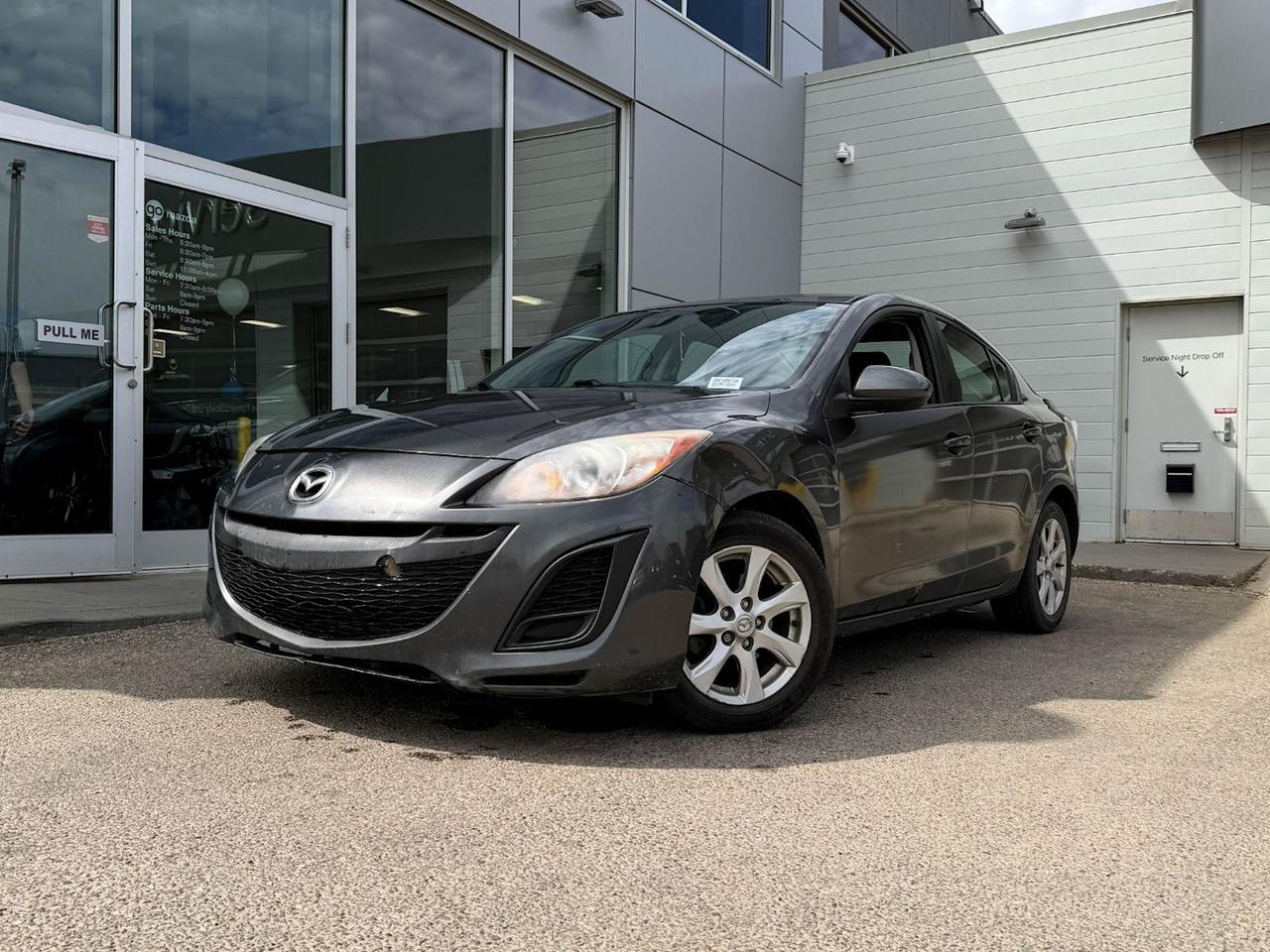 Experience dependable style and efficiency with this pre-owned 2011 Mazda Mazda3 GX in sleek Grey. Known for its sporty handling and fuel-efficient performance, the Mazda3 GX delivers a smooth and enjoyable ride perfect for daily commuting and weekend adventures. Dont miss out on a reliable, well-crafted compact sedan that combines Mazdas signature driving dynamics with timeless design. Stop by Go Mazda today and take it for a test drive!Vehicle has a claim of $1294.79 on the Carfax history reportGo Mazda is a AMVIC licenced business.