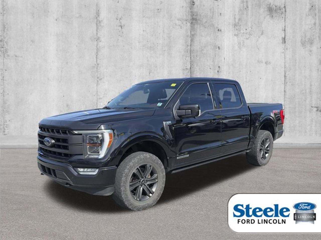 Agate Black Metallic2021 Ford F-150 Lariat4WD 10-Speed Automatic 3.5L PowerBoost Full-Hybrid V6VALUE MARKET PRICING!!, 3.5L PowerBoost Full-Hybrid V6, 4WD.Awards:* NACTOY 2021 North American Truck of the YearALL CREDIT APPLICATIONS ACCEPTED! ESTABLISH OR REBUILD YOUR CREDIT HERE. APPLY AT https://steeleadvantagefinancing.com/6198 We know that you have high expectations in your car search in Halifax. So if youre in the market for a pre-owned vehicle that undergoes our exclusive inspection protocol, stop by Steele Ford Lincoln. Were confident we have the right vehicle for you. Here at Steele Ford Lincoln, we enjoy the challenge of meeting and exceeding customer expectations in all things automotive.