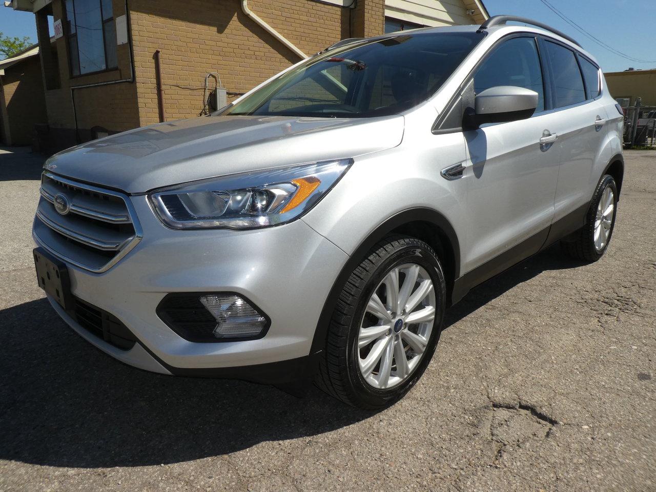 <p>Looking for a clean, reliable, and fuel-efficient SUV? This 2019 Ford Escape AWD checks all the boxes. Equipped with Fords powerful yet economical 1.5L 4Cyl EcoBoost engine and Intelligent All-Wheel Drive. This vehicle is very clean, runs and drives excellent. SAFETY PACKAGE IS AN EXTRA $599.</p><p>Vehicle Equipment:</p><ul><li data-section-id=18ramcy data-start=589 data-end=617>1.5L 4Cyl EcoBoost Turbo Engine</li><li data-section-id=18ramcy data-start=589 data-end=617>Intelligent AWD</li><li data-section-id=hwoeeb data-start=618 data-end=642>Automatic Transmission</li><li data-section-id=1tas6zj data-start=643 data-end=658>Backup Camera</li><li data-section-id=6cci00 data-start=659 data-end=679>Heated Front Seats</li><li data-section-id=1upedxz data-start=680 data-end=702>Bluetooth Hands-Free</li><li data-section-id=q4m7a data-start=703 data-end=733>Apple CarPlay & Android Auto</li><li data-section-id=zutwrf data-start=734 data-end=755>Touchscreen Display</li><li data-section-id=1ck5ydw data-start=756 data-end=772>Cruise Control</li><li data-section-id=h2kbia data-start=773 data-end=788>Keyless Entry</li><li data-section-id=1ngu1dm data-start=789 data-end=822>Power Windows / Locks / Mirrors</li><li data-section-id=1e35wlb data-start=823 data-end=837>Alloy Wheels</li><li data-section-id=yd4wzz data-start=860 data-end=882>Fold-Flat Rear Seats</li><li data-section-id=shkldv data-start=883 data-end=911>Ice Cold A/C</li></ul>