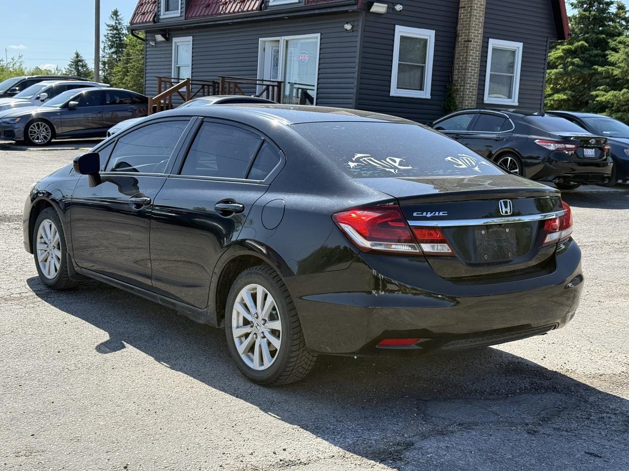 2015 Honda Civic 4dr Man EX Photo4