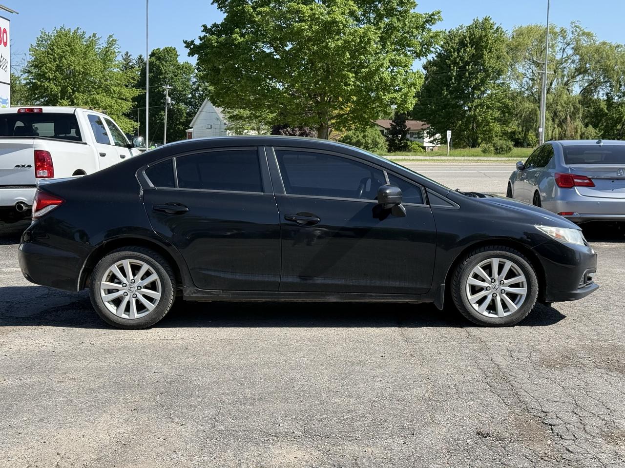 2015 Honda Civic 4dr Man EX Photo2