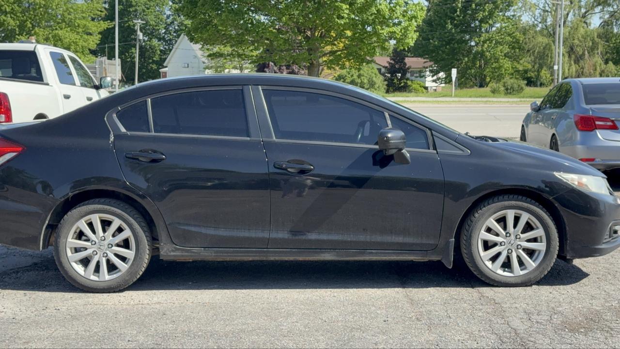 2015 Honda Civic 4dr Man EX Photo