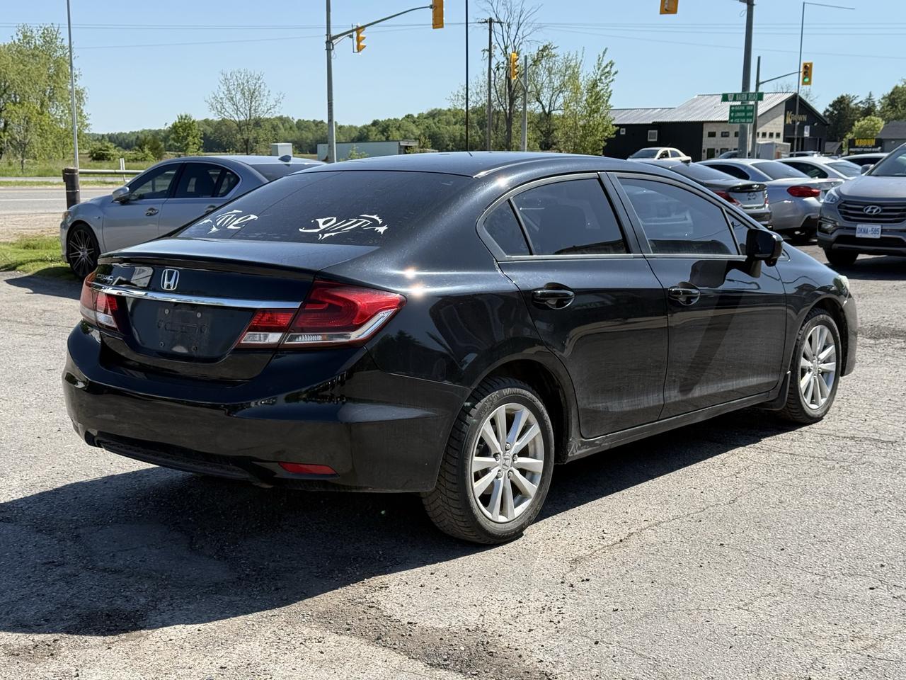 2015 Honda Civic 4dr Man EX Photo