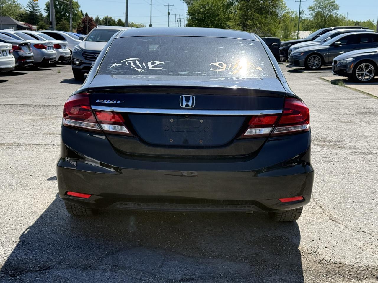 2015 Honda Civic 4dr Man EX Photo