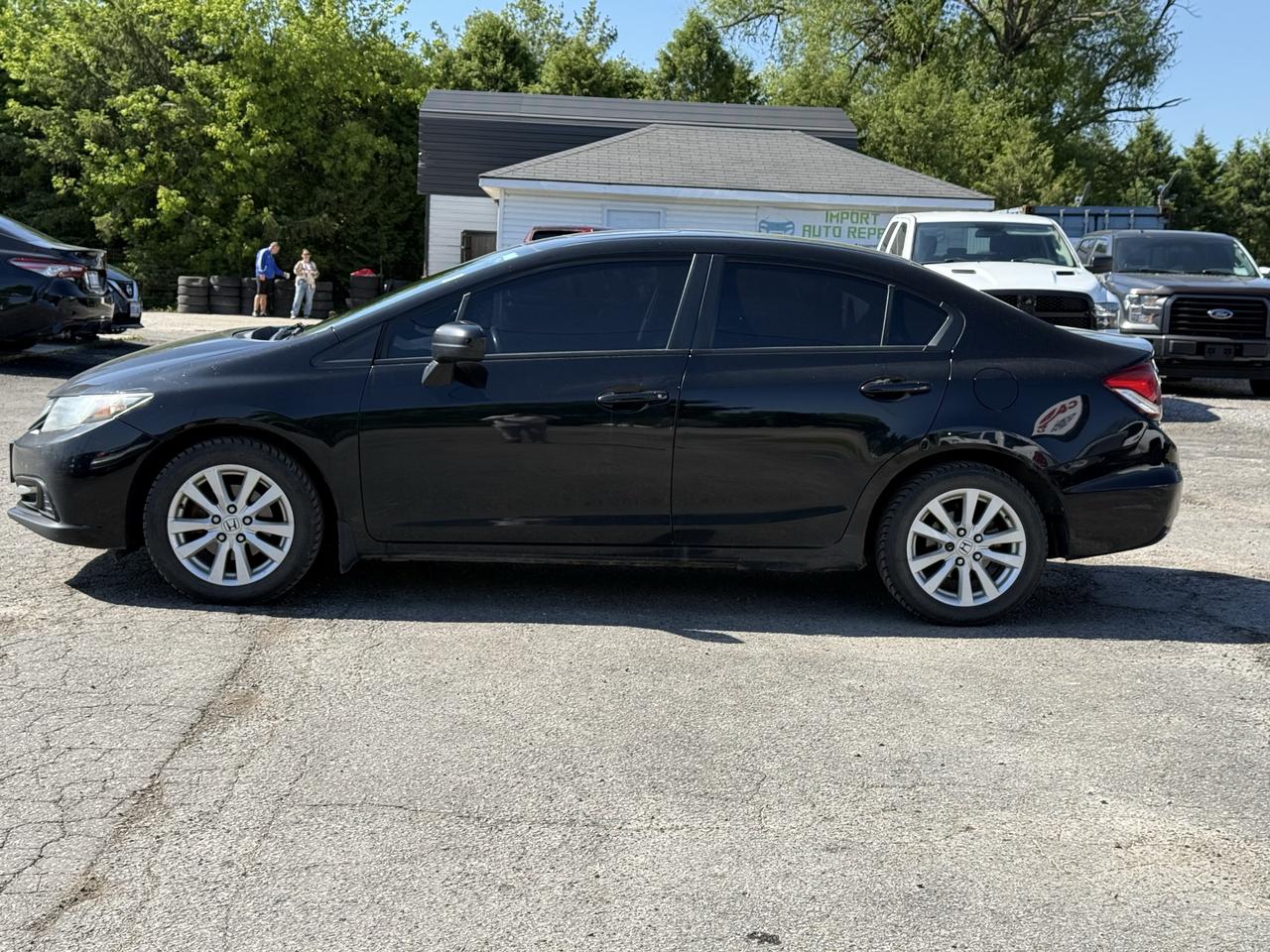 2015 Honda Civic 4dr Man EX Photo