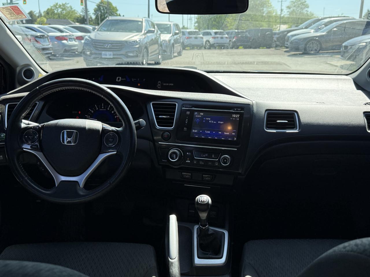 2015 Honda Civic 4dr Man EX Photo