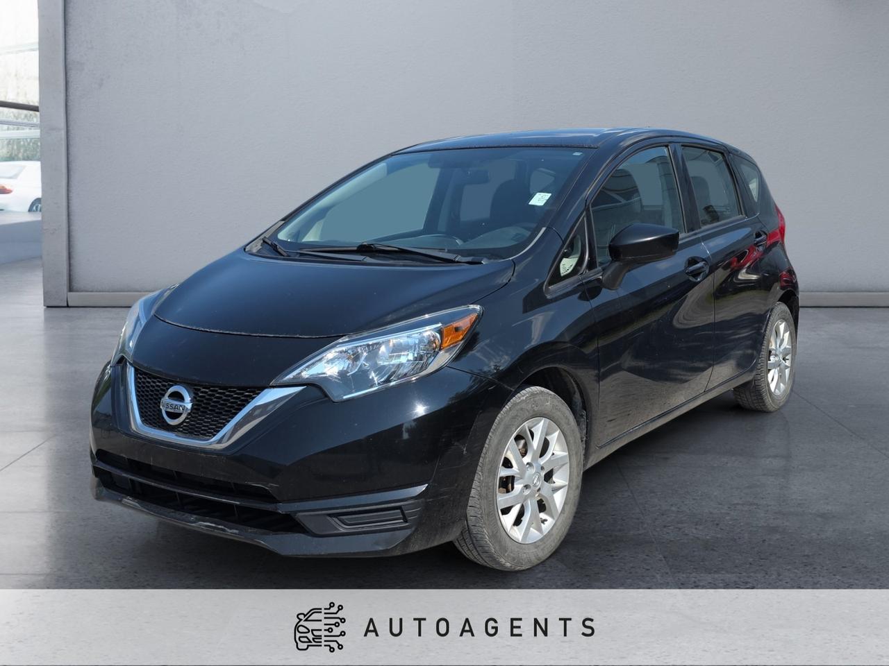 <p> 1.6L 4-Cylinder Engine<br data-start=52 data-end=55> Xtronic CVT Automatic Transmission<br data-start=91 data-end=94> Front-Wheel Drive (FWD)<br data-start=119 data-end=122> SV Trim Package<br data-start=139 data-end=142> 15 Alloy Wheels<br data-start=160 data-end=163> Rear Roof Spoiler<br data-start=182 data-end=185> Halogen Headlights<br data-start=205 data-end=208> Heated Power Side Mirrors<br data-start=235 data-end=238> Keyless Entry with Push Button Start<br data-start=276 data-end=279> Remote Start (if equipped)<br data-start=307 data-end=310> Air Conditioning<br data-start=328 data-end=331> Premium Cloth Seating Surfaces<br data-start=363 data-end=366> 60/40 Split Folding Rear Seats<br data-start=398 data-end=401> Height Adjustable Driver Seat<br data-start=432 data-end=435> Leather-Wrapped Steering Wheel<br data-start=467 data-end=470> Cruise Control<br data-start=486 data-end=489> Power Windows, Locks & Mirrors<br data-start=521 data-end=524> Tilt Steering Wheel<br data-start=545 data-end=548> 5 Colour Display Audio System<br data-start=580 data-end=583> Bluetooth Hands-Free Calling & Audio Streaming<br data-start=631 data-end=634> USB & Auxiliary Input<br data-start=657 data-end=660> AM/FM/CD Audio System<br data-start=683 data-end=686> Steering Wheel Mounted Audio Controls<br data-start=725 data-end=728> Rear View Camera<br data-start=746 data-end=749> Nissan Advanced Airbag System<br data-start=780 data-end=783> Vehicle Dynamic Control (VDC)<br data-start=814 data-end=817> Traction Control System<br data-start=842 data-end=845> Anti-Lock Braking System (ABS)<br data-start=877 data-end=880> Tire Pressure Monitoring System<br data-start=913 data-end=916> Rear Window Defroster & Wiper</p><p>This <strong data-start=994 data-end=1023>2018 Nissan Versa Note SV</strong> in black offers excellent fuel efficiency, versatile hatchback practicality, and affordable everyday driving. Powered by a reliable 1.6L engine paired with Nissans smooth Xtronic CVT transmission, it delivers a comfortable and economical ride perfect for commuting or city driving. Equipped with convenient features like keyless entry, backup camera, Bluetooth connectivity, and split folding rear seats, this Versa Note SV provides outstanding value, cargo flexibility, and dependable performance.</p>