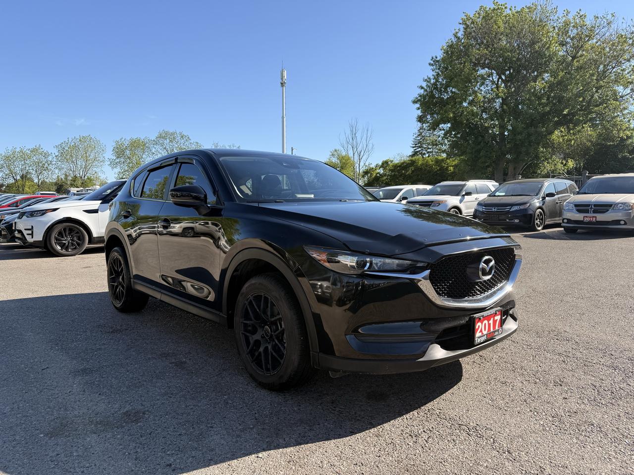 <p>Looking for a stylish and capable SUV thats perfect for Canadian roads? Target Auto Centre has a fantastic pre-owned 2017 Mazda CX-5 GS thats ready for its next adventure. This sleek black-on-black beauty offers the refined driving experience Mazda is known for, combined with the practicality and versatility of an SUV. Whether youre navigating city streets or heading out for a weekend getaway, the CX-5 delivers a smooth, comfortable, and engaging ride. With its all-wheel-drive system and a robust 2.5L engine, it&rsquo;s equipped to handle whatever the weather or road conditions throw your way.&nbsp;Step inside and youll find a well-appointed black interior designed for driver and passenger comfort. The 2017 CX-5 GS trim offers a great balance of modern features and an intuitive layout, making every drive a pleasure. It&rsquo;s a well-maintained vehicle that&rsquo;s eager to provide many more kilometers of enjoyable driving for its new owner.</p><p>&nbsp;</p><hr><p>&nbsp;</p><p><strong>CERTIFIED PRE-OWNED VEHICLE | BUY WITH CONFIDENCE</strong></p><p>&nbsp;- Ontario Safety Standards Certificate Included<br>- 30 Day / 1,000 KM Safety Warranty Included<br>- Fully Detailed Prior to Delivery<br>- CARFAX Vehicle History Report Available</p><p>&nbsp;</p><hr><p>&nbsp;</p><p><strong>FINANCING MADE SIMPLE | ALL CREDIT WELCOME</strong></p><p>&nbsp;- $0 Down Payment Options Available<br>- Competitive Rates Through Trusted Lenders<br>- Fast Approvals | Simple Application Process<br>- On-site Financing Assistance<br>- Good Credit | Bad Credit | No Credit Options<br>- Apply Now</p><p>&nbsp;</p><hr><p>&nbsp;</p><p><strong>VALUE AND TRANSPARENCY | WHY CHOOSE US</strong></p><p>- Price Plus HST & Licensing Only<br>- No Additional Fees | All-In Pricing<br>- Same Price Cash or Finance<br>- Extended Warranty Protection Plans Available<br>- Autotrader Best Priced Dealer Award (2024)<br>- Competitive Market Value on Trade-ins<br>- We&rsquo;ll Buy Your Car &mdash; No Purchase Required<br>- Know Someone Looking For a Vehicle? Get a Referral Award<br>- Open 7 Days a Week</p><p>&nbsp;</p><hr><p>&nbsp;</p><p><strong>ABOUT TARGET AUTO CENTRE</strong></p><p>Target Auto Centre has been proudly serving London, Ontario and surrounding areas for over 20 years, offering over 150 quality pre-owned vehicles and a constantly updated selection to choose from. We focus on providing competitive pricing, clear information, and a straightforward buying process so you know exactly what to expect from start to finish.</p><p>Cars For Everyone! We offer a wide selection of vehicles to fit every lifestyle, need, and budget. Our inventory includes cars, trucks, SUVs, and vans from trusted brands such as Ford, Chevrolet, Toyota, Honda, Nissan, BMW, Mercedes-Benz, Audi, Lexus, Acura, Hyundai, Kia, Mazda, Volkswagen, Jeep, RAM, GMC, Subaru, and more. With new arrivals regularly, there&rsquo;s always something for everyone.</p><p>As a proud member of the Used Car Dealers Association of Ontario (UCDA), we are committed to operating with honesty, transparency, and professionalism in every transaction. Our goal is to make your vehicle purchase as simple and stress-free as possible, while delivering the level of service our customers continue to trust. Come visit us today and see why were the preferred choice for pre-owned vehicles in London and the surrounding areas. We look forward to earning your business!</p>