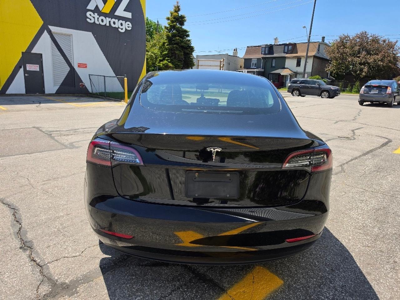2021 Tesla Model 3 STANDARD RANGE PLUS-AUTOPILOT-CERTIFIED Photo