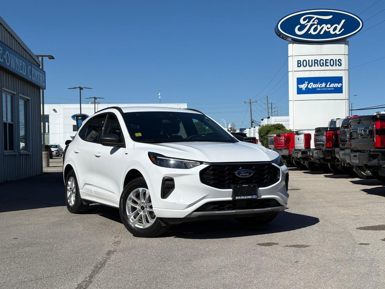 <p>Experience the 2023 Ford Escape ST-Line AWD in a stunning white finish, designed to offer confidence and command on any road with its capable AWD drivetrain and smooth automatic transmission. This SUV promises exceptional handling, making it perfect for Canadian terrains.</p><p>The exterior boasts eye-catching alloy wheels that complement its stylish silhouette, while inside, the Escape offers a sleek black interior, combining comfort with modern design. With features like heated front row seats, a heated steering wheel, and heated mirrors, your daily drive is made more luxurious and convenient.</p><p>Stay seamlessly connected and in control with smart technology including a backup camera, Bluetooth connection, and smart device integration. Safety takes the front seat with advanced features such as brake assist and lane assist, ensuring a safer journey. The Ford Escape also keeps you connected on the go with a Wi-Fi hotspot, so you never miss a moment.</p><p>Ideal for families and adventurers alike who appreciate style, technology, and safety, this 2023 Ford Escape ST-Line AWD is ready to enhance your driving experience. Contact Bourgeois Motors Ltd. today to learn more and arrange a test drive.</p> <p><strong>Why Choose the Bourgeois Auto Group?</strong></p><p>For 80 years, Bourgeois Auto Group has been delivering exceptional automotive experiences. Our factor trained teams work to ensure you receive the shopping experience you deserve; whether you're looking for a new or new-to-you vehicle.</p><p>Shop 24/7 with our online showroom and chat service, ensuring convenience every step of the way. No hidden fees, full disclosure, and every pre-owned vehicle comes with a Carfax® report for peace of mind.</p><p>We offer a wide selection of pre-owned vehicles, all competitively priced using real-time market data. Get the best deal on your purchase and trade-in with our free Live Market Analysis report.</p><p>Looking to sell your car? We buy any make or modelno purchase required. Our simple to use online trade valuation tool will provide you with a clear, transparent selling experience whether you buy our car or not.</p><p>Backed by hundreds dedicated employees across 4 convenient locations, were here to meet all your automotive needs. Visit us in Midland or Parry Sound and explore our inventory or schedule your next service today.</p> <p><strong>Financing Your Next Vehicle with Bourgeois Motors Ford in Midland:</strong></p><p>At Bourgeois Motors Ford, we make financing your next vehicle simple and stress-free! Our team works with trusted lenders to find flexible options tailored to your budget. Drive away with confidenceapply today!</p><p>Take advantage of our online pre-qualification tool, backed by Equifax and TD Bank to find the payment that works for you. Simply <a href=https://www.bourgeoismotors.com/free-credit-check/ rel=nofollow><strong>CLICK HERE</strong></a><strong> </strong>to use our secure online credit tool with no impact to your credit.</p>