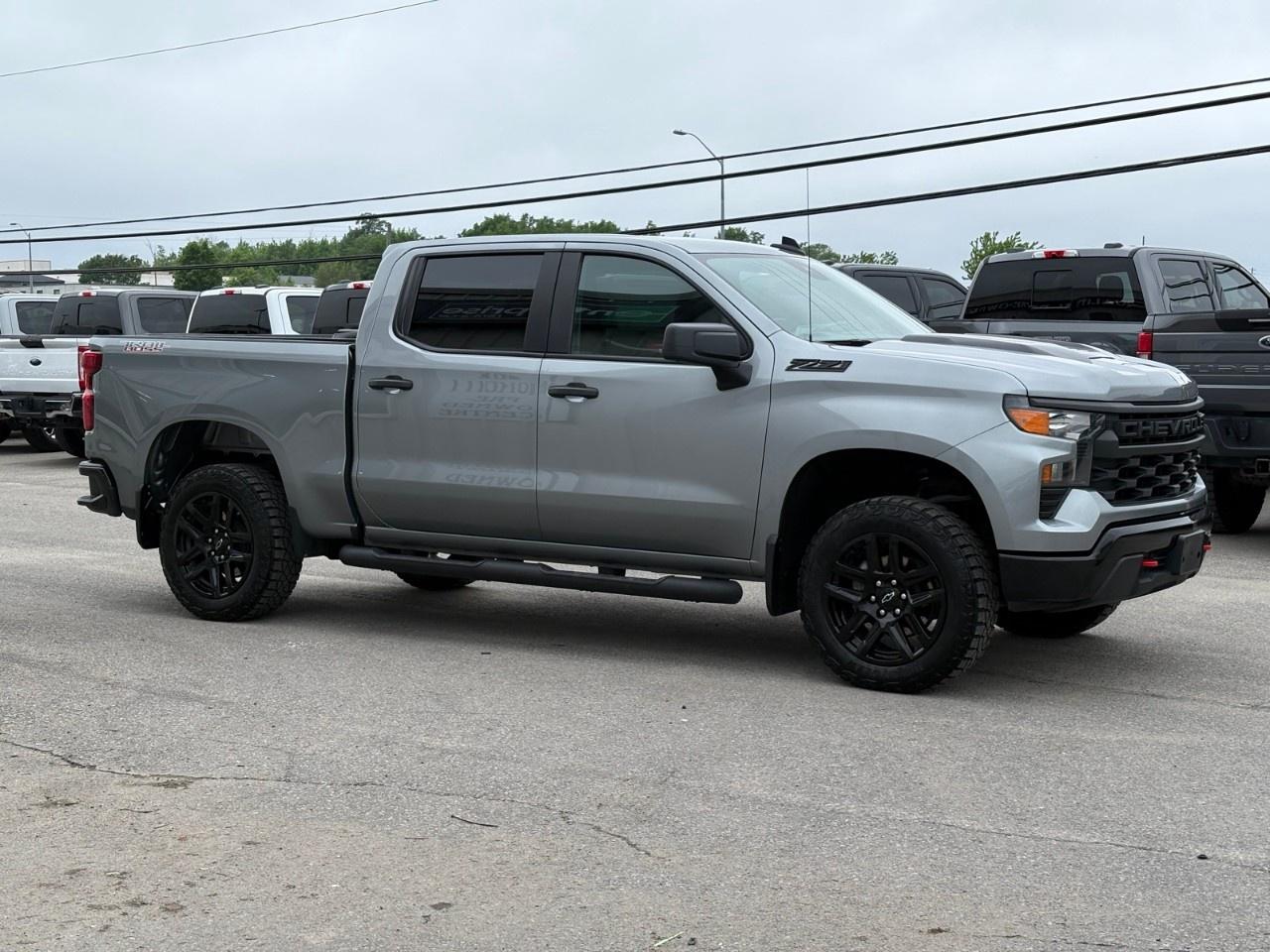 2025 Chevrolet Silverado 1500 Crew Cab Short Box 4-Wheel Drive Custom Trail Boss Photo