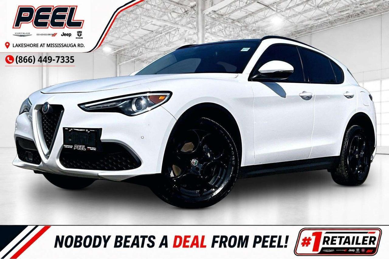COME SEE WHY NOBODY BEATS A DEAL FROM PEEL! Your Source for ALL make and models used cars and trucks. 2019 Alfa Romeo Stelvio Sport AWD | 2.0L Turbocharged I-4 Engine | Alfa White | Leather-faced Bucket Seats | Dual-pane Panoramic Sunroof | Cold Weather Package | Driver Assistance Dynamics Plus Package | Adaptive Cruise Control | Lane Keep Assist | Forward Collision Warning | Blind Spot Monitoring | Apple CarPlay & Android Auto | Heated Steering Wheel | Remote Start | 19" Sport 5-hole Wheels Clean Carfax Italian styling, sharp handling, and luxury SUV practicality come together beautifully in this 2019 Alfa Romeo Stelvio Sport AWD finished in striking Alfa White. Designed for drivers who want something far more exciting than the average luxury crossover, the Stelvio delivers sporty performance and unmistakable road presence thanks to its responsive 2.0L turbocharged engine, athletic chassis tuning, and confidence-inspiring all-wheel drive system. Inside, the driver-focused cabin features leather-faced bucket seats, a dual-pane panoramic sunroof, heated steering wheel, remote start, and premium materials throughout that give the Stelvio a true European luxury feel. Technology and safety are equally impressive with Apple CarPlay & Android Auto, Adaptive Cruise Control, Lane Keep Assist, Forward Collision Warning, Blind Spot Monitoring, and the Driver Assistance Dynamic Plus Package adding confidence and convenience on every drive. The Cold Weather Package makes it perfectly suited for Canadian winters, while the iconic 19" 5-hole sport wheels complete the aggressive Italian styling that makes this SUV stand out everywhere it goes. Backed by a Clean Carfax, this Stelvio Sport offers the perfect combination of luxury, performance, exclusivity, and everyday practicality for buyers looking for something far more distinctive than the typical luxury SUV. ______________________________________________________ FREE CarFax included! Click the CarFax link in the listing to view the report. Our advertised prices are for consumers/end users only and are not intended for dealer, wholesale, exporter, or broker purchases. ______________________________________________________ Peel Chrysler is based in Port Credit, Mississauga, and proudly serves customers across Ontario and Canada, including Toronto, Oakville, North York, Richmond Hill, Ajax, Hamilton, Niagara Falls, Brampton, Scarborough, Vaughan, London, Windsor, Cambridge, Kitchener, Waterloo, Brantford, Sarnia, Pickering, Huntsville, Milton, Woodbridge, Aurora, Newmarket, Orangeville, Georgetown, Markham, North Bay, Sudbury, Barrie, Oshawa, Kingston, Innisfil, and surrounding areas. Browse our selection of used cars, trucks, SUVs, vans, Ram, Jeep, Dodge, Chrysler, FIAT, and all makes and models at peelchrysler.com. ______________________________________________________ Disclaimer: Prices are for consumer/end-user purchases only. Advertised prices are all-in and include all dealer fees and charges, including the $499 loan processing fee where applicable, except HST, Fuel and Licensing, unless otherwise stated. Payments, rates, and terms are subject to approved credit and may change without notice. If a trade-in has an outstanding loan balance and Peel Chrysler is required to facilitate the lien payout, a $349 lien payout fee applies. Most pre-owned vehicles originally come with two keys; however, all Peel Chrysler pre-owned vehicles come standard with one key unless otherwise stated. Vehicle images may be digitally adjusted or enhanced for presentation purposes and may not always reflect the exact appearance of the vehicle. While we make every effort to ensure accuracy, vehicle details, features, options, materials, history, specifications, pricing, availability, and CarFax information should be verified with Peel Chrysler before purchase.