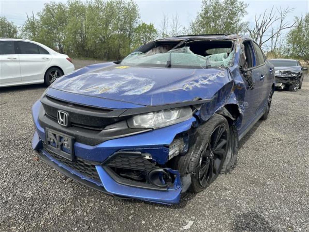Sold As-Is. CarFax Provided. Excellent opportunity to rebuild this sporty blue hatchback. Vehicle does run. Dont miss your chance, book your appointment today