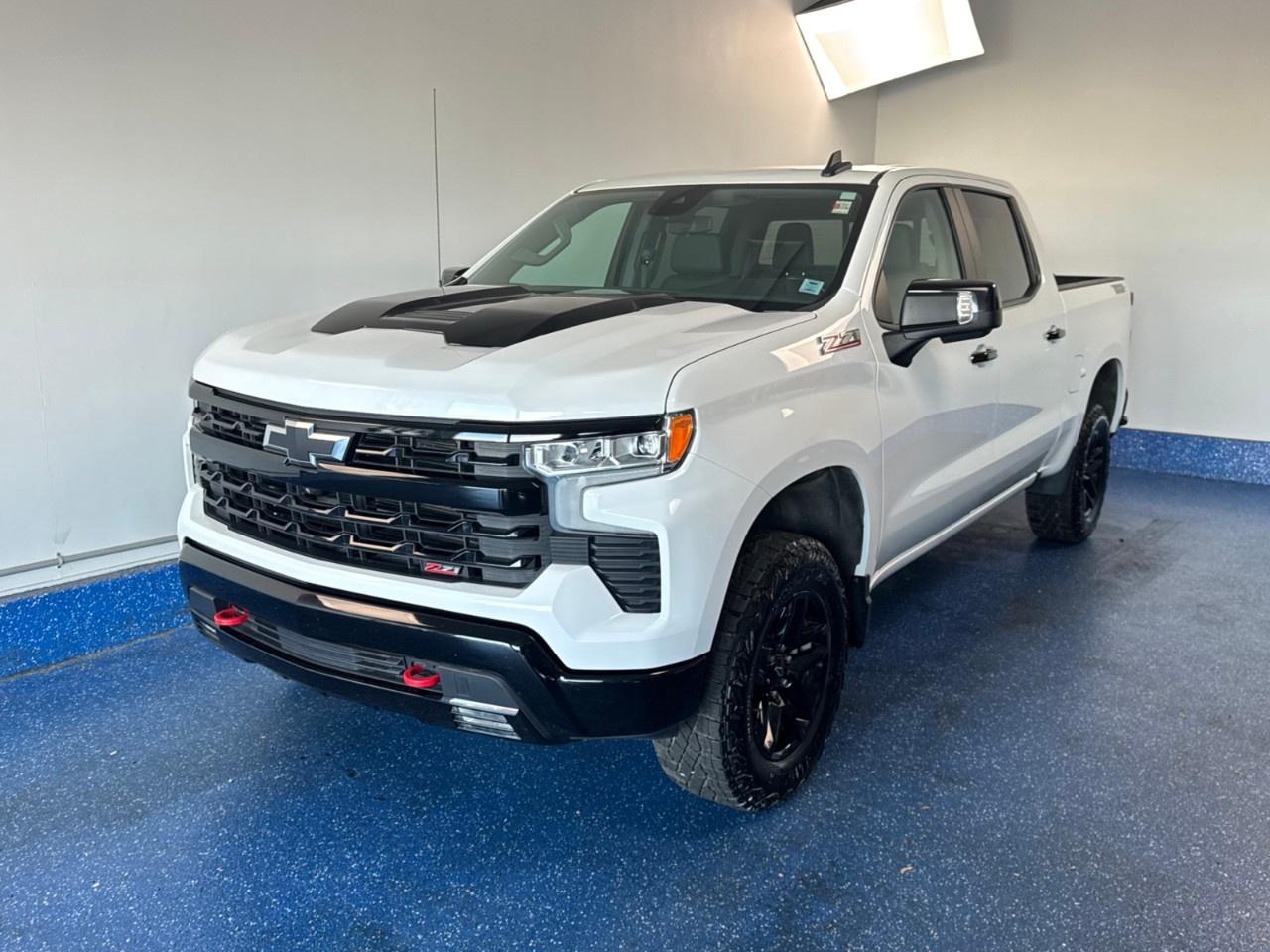 New Price! 2023 Chevrolet Silverado 1500 LT Trail Boss Crew Cab LT Trail Boss | 5.3L V8 | Leather Seats | Certified. 10-Speed Automatic 4WD Summit White EcoTec3 5.3L V8<br />Odometer is 20628 kilometers below market average!<br /><br />10-Speed Automatic, 4WD, Jet Black w/Leather-Appointed Front Seat Trim, 10-Way Power Driver Seat w/Lumbar, 12.3''' Multicolour Reconfigurable Digital Display, 120-Volt Bed Mounted Power Outlet, 120-Volt Instrument Panel Power Outlet, 6-Speaker Audio System, All-Weather Floor Liner (LPO) (AAK), Apple CarPlay/Android Auto, Auto-Locking Rear Differential, Automatic temperature control, Bluetooth® For Phone, Chevrolet Connected Access Capable, Chevytec Spray-On Black Bedliner, Colour-Keyed Carpeting Floor Covering, Compass, Convenience Package, Convenience Package II, Deep-Tinted Glass, Dual Rear USB Ports (Charge Only), Dual-Zone Automatic Climate Control, Electric Rear-Window Defogger, Electrical Steering Column Lock, Electronic Cruise Control, EZ Lift Power Lock & Release Tailgate, Forward Collision Alert, Front fog lights, Front LED Fog Lamps, HD Rear Vision Camera, HD Surround Vision, Heated Driver & Front Outboard Passenger Seats, Heated Power-Adjustable Outside Mirrors, Heated Steering Wheel, Heated steering wheel, High Gloss Black Mirror Caps, Hitch Guidance, Hitch Guidance w/Hitch View, Inside Rear-View Mirror w/Tilt, Integrated Trailer Brake Controller, Keyless Open & Start, Leather Package, Leather-Appointed Front Seat Trim, LED Cargo Area Lighting, LT Trail Boss Premium Package, OnStar & Chevrolet Connected Services Capable, Performance Red Recovery Hooks, Perimeter Lighting, Power Front Windows w/Driver Express Up/Down, Power Front Windows w/Passenger Express Down, Power Rear Windows w/Express Down, Power Sliding Rear Window w/Rear Defogger, Power Tailgate, Power windows, Preferred Equipment Group 2LT, Premium Bose 7-Speaker Sound System, Protection Package, Rear 60/40 Folding Bench Seat (Folds Up), Rear Cross Traffic Alert-Braking, Rear Park Assist, Rear Pedestrian Alert, Rear Wheelhouse Liners, Remote keyless entry, Remote Vehicle Starter System, Safety Package, SiriusXM w/360L, Standard Tailgate, Steering Wheel Audio Controls, Telescoping steering wheel, Theft Deterrent System (Unauthorized Entry), Trailer Camera Provisions, Trailer Side Blind Zone Alert, Trailering App, Trailering Package, Universal Home Remote, Up-Level Rear Seat w/Storage Package, Wheels: 18''' x 8.5''' Black Painted Aluminum, Wi-Fi Hot Spot Capable, Wireless Phone Projection, Wrapped Steering Wheel.<br /><br />Certification Program Details: Fresh 2 Yr MVI | 30 day warranty* | 110 point inspection | Full tank of fuel | Krown rustproofed | Flexible financing options | Professionally detailed<br /><br />This vehicle is Zacks Certified! You're approved! We work with you. Together we'll find a solution that makes sense for your individual situation. Please visit us or call 902 843-3900 to learn about our great selection.<br /><br />With 22 lenders available Zack's Auto Sales can offer our customers with the lowest available interest rate. Thank you for taking the time to check out our selection!