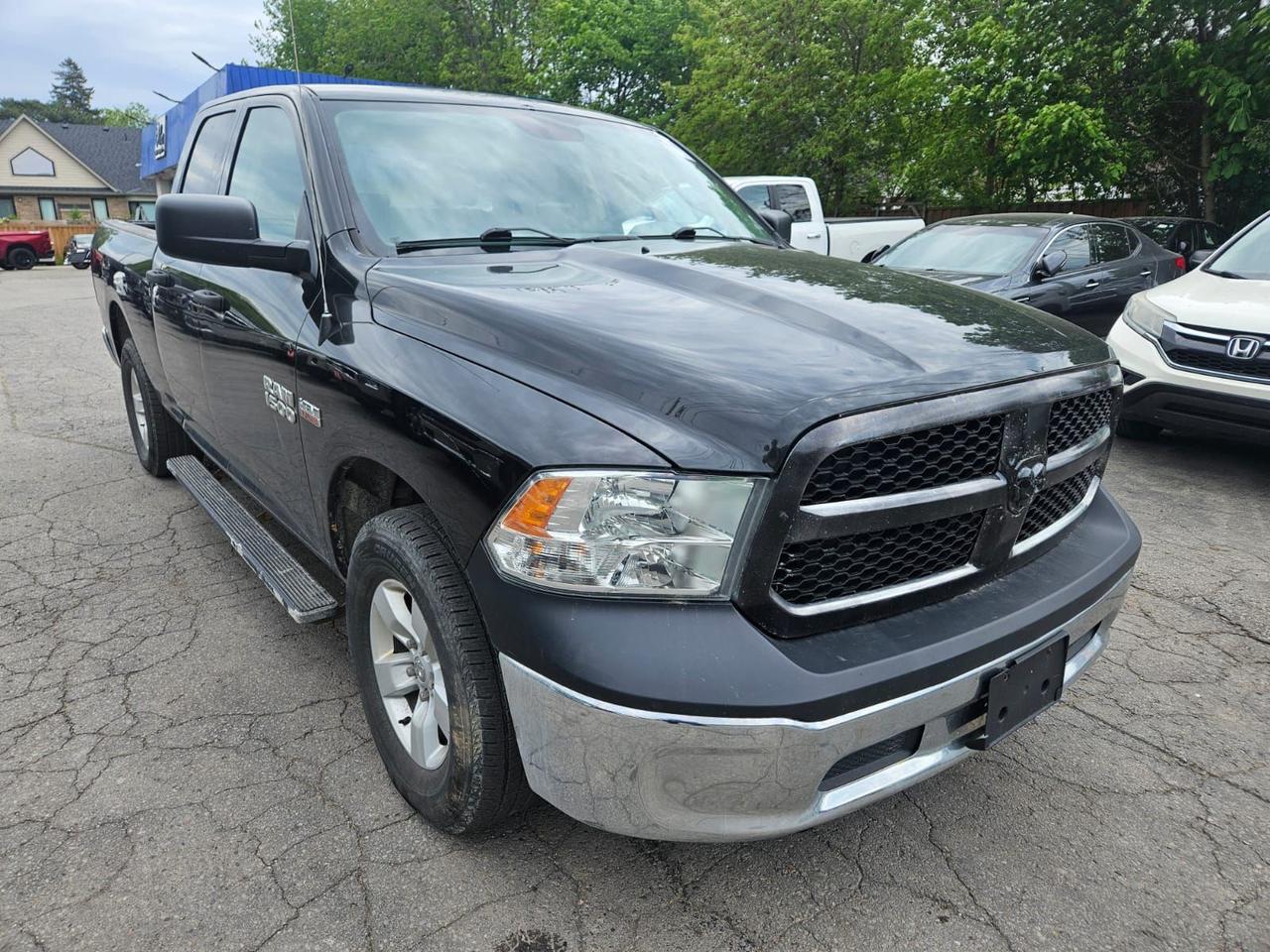 2017 RAM 1500 4WD QUAD CAB 140.5" ST Photo