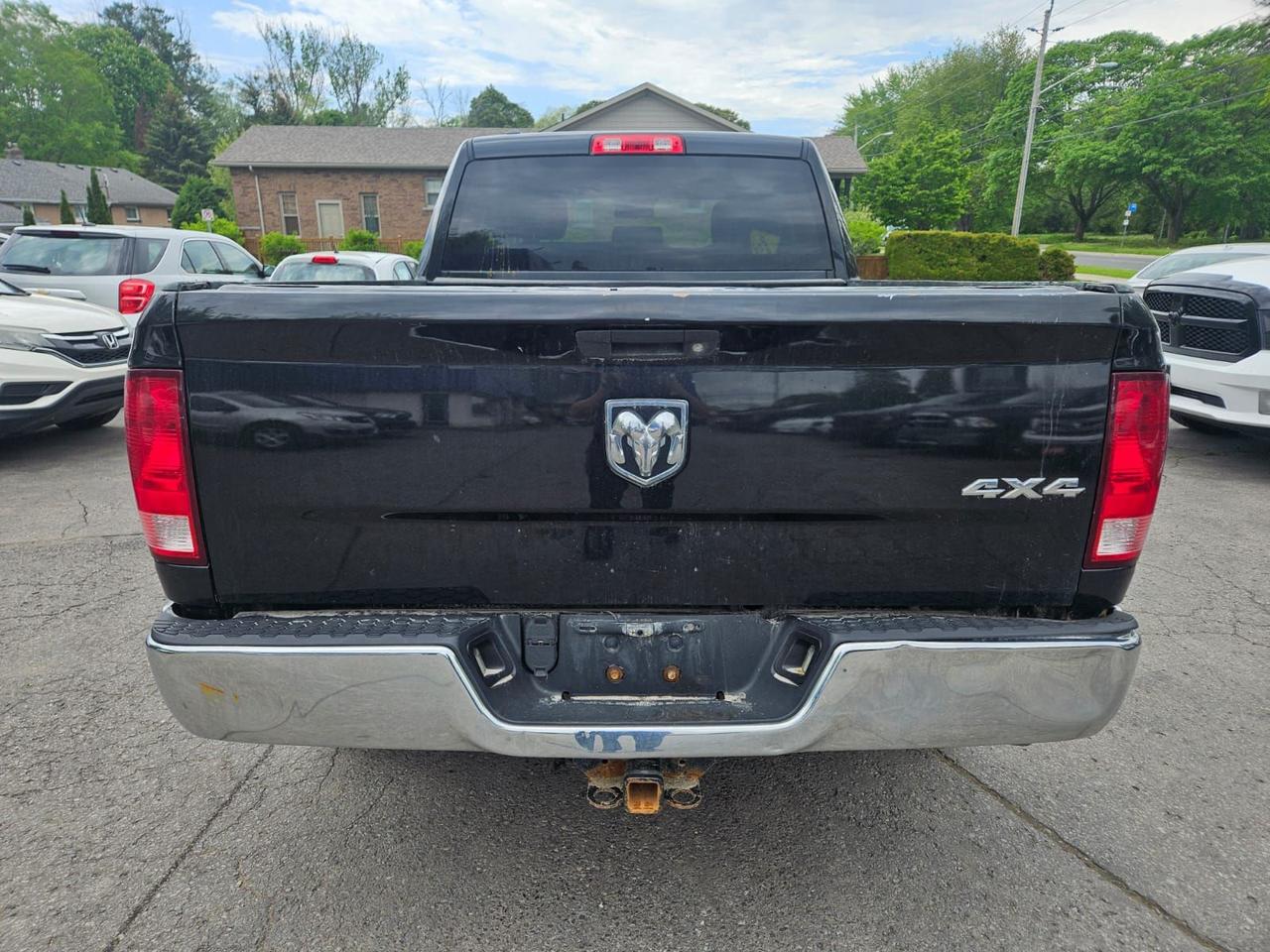 2017 RAM 1500 4WD QUAD CAB 140.5" ST Photo