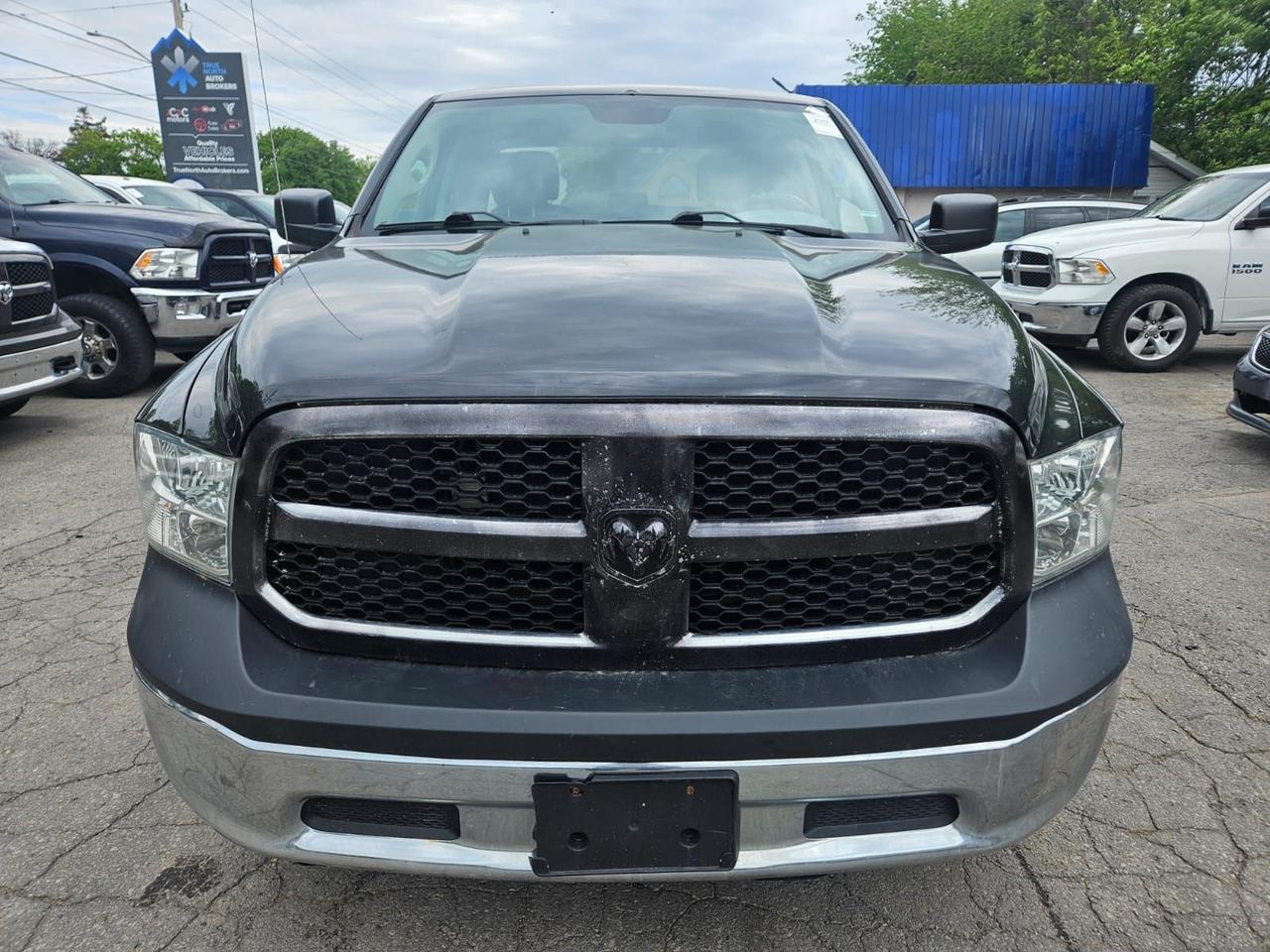 2017 RAM 1500 4WD QUAD CAB 140.5" ST Photo