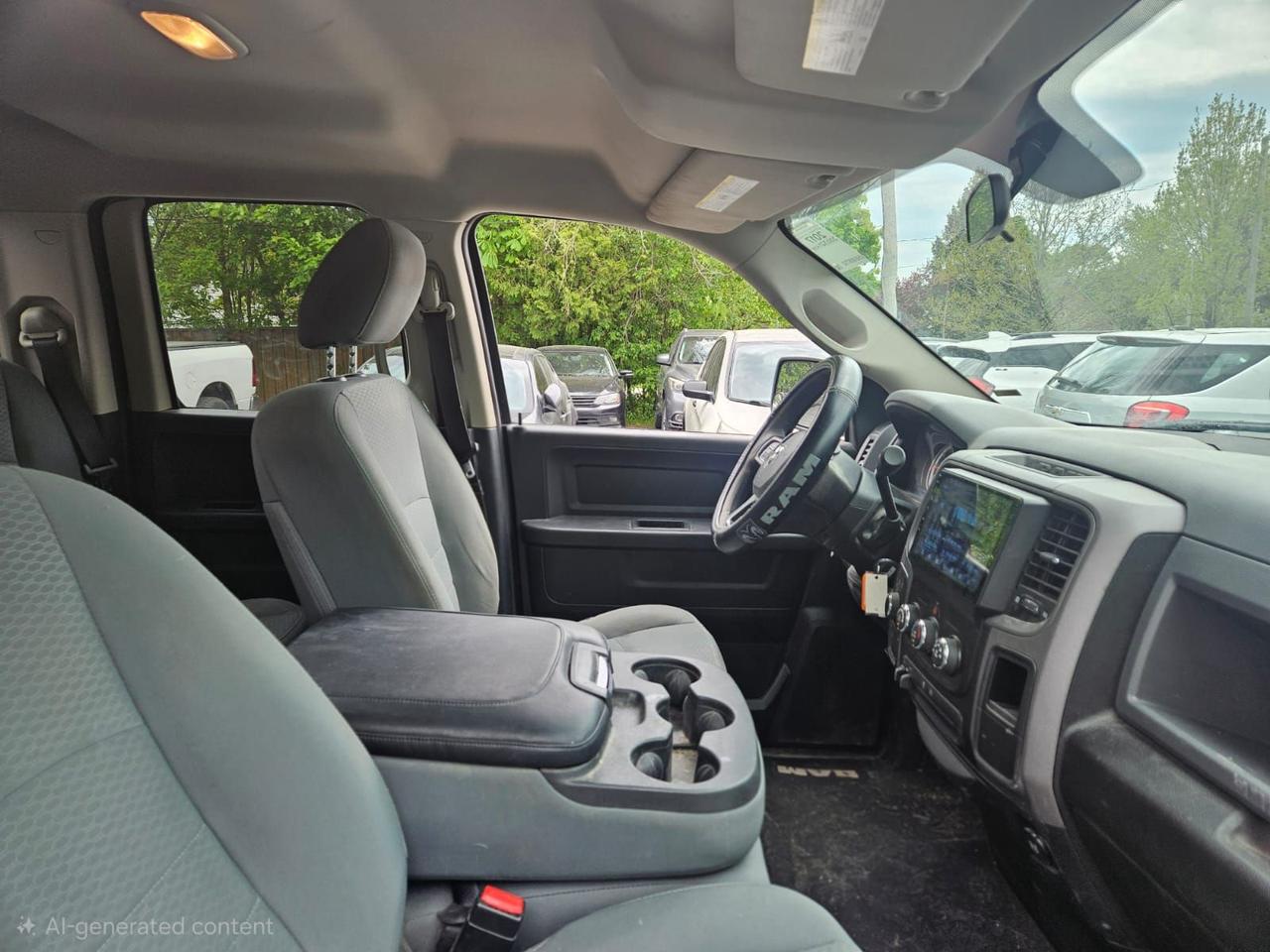 2017 RAM 1500 4WD QUAD CAB 140.5" ST Photo