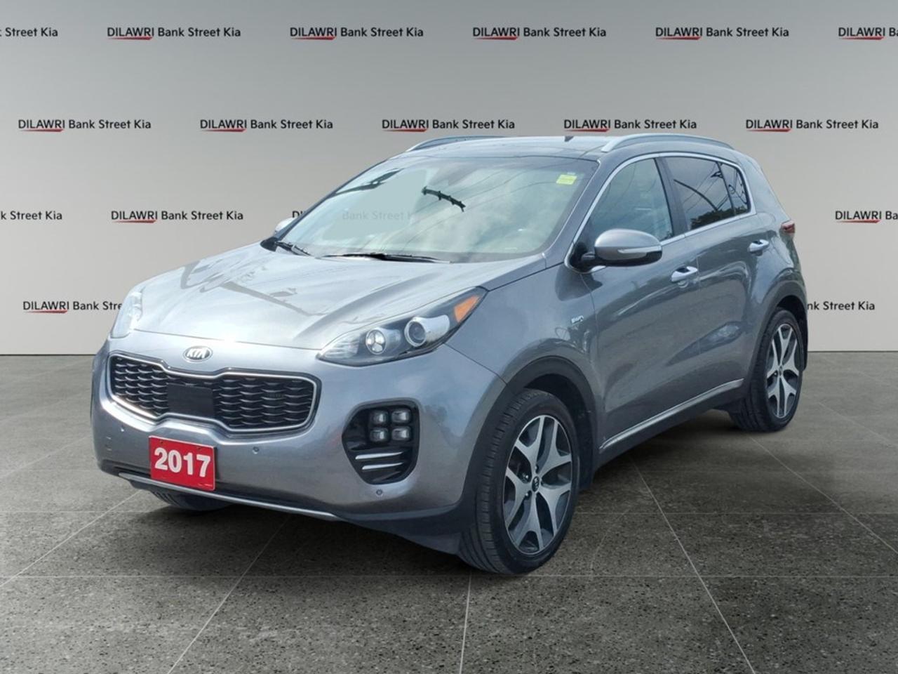 *** CASH PURCHASE PRICE $18900 PLUS HST *** A sleek, powerful, and incredibly well-equipped SUV awaits! Presenting the 2017 Kia Sportage SX Turbo w/Black, a premium compact crossover designed to elevate every journey. With just 94,678 kilometers, this meticulously maintained Sportage offers an exceptional blend of performance, luxury, and advanced technology, all wrapped in a striking SILVER exterior. Step inside and discover an interior tailored for ultimate comfort and convenience. Youll stay connected and entertained with seamless Apple CarPlay / Android Auto integration and Satellite Radio, while Bluetooth ensures hands-free communication. Navigating is a breeze thanks to the integrated Navigation System. Experience year-round comfort with Heated Seats (front and rear) and a Heated Steering Wheel, complemented by Ventilated Front Seats for warmer days. Safety is paramount, featuring advanced systems like Lane Departure Warning and Blind Spot Monitor, along with Parking Assist for stress-free maneuvers. The Power Liftgate adds practicality, and the panoramic Power Moonroof invites natural light and an open-air feel. Effortless access is provided by Keyless Entry & Start, and Cruise Control makes long drives more relaxing. Under the hood, the heart of this Sportage SX Turbo beats with a spirited 2.0L T-GDI I4 D-CVVT engine, delivering an exhilarating 237 horsepower and 260 lb.-ft. of torque. Paired with a smooth 6-speed Automatic w/Sportmatic transmission and Kias capable All-Wheel Drive (AWD) system, this SUV provides confident handling and impressive responsiveness in all conditions. Enjoy a balanced drive with fuel efficiency ratings of 11.9 L/100km city and 10.2 L/100km highway (19.8 city, 23.1 highway MPG). Key Features Include: Apple CarPlay / Android Auto & Bluetooth Connectivity All-Wheel Drive (AWD) System Heated Front & Rear Seats with Ventilated Front Seats Heated Steering Wheel Power Liftgate & Power Moonroof Navigation System Keyless Entry & Push Button Start Advanced Safety: Lane Departure Warning, Blind Spot Monitor, Parking Assist (Front & Rear Sensors, Rear Camera) Premium Leather Upholstery 2.0L Turbocharged Engine (237hp, 260 lb.-ft. torque) High-Intensity Discharge (HID) Headlights & Front Fog Lights Dual-Zone Automatic Climate Control Steering Wheel Mounted Audio Controls 19-inch Alloy Wheels Dont miss the opportunity to own this exceptional 2017 Kia Sportage SX Turbo. Combining robust performance, sophisticated safety features, and a luxurious interior, its ready for your next adventure. Contact us today to schedule your personalized test drive and experience the thrill of this premium SUV!