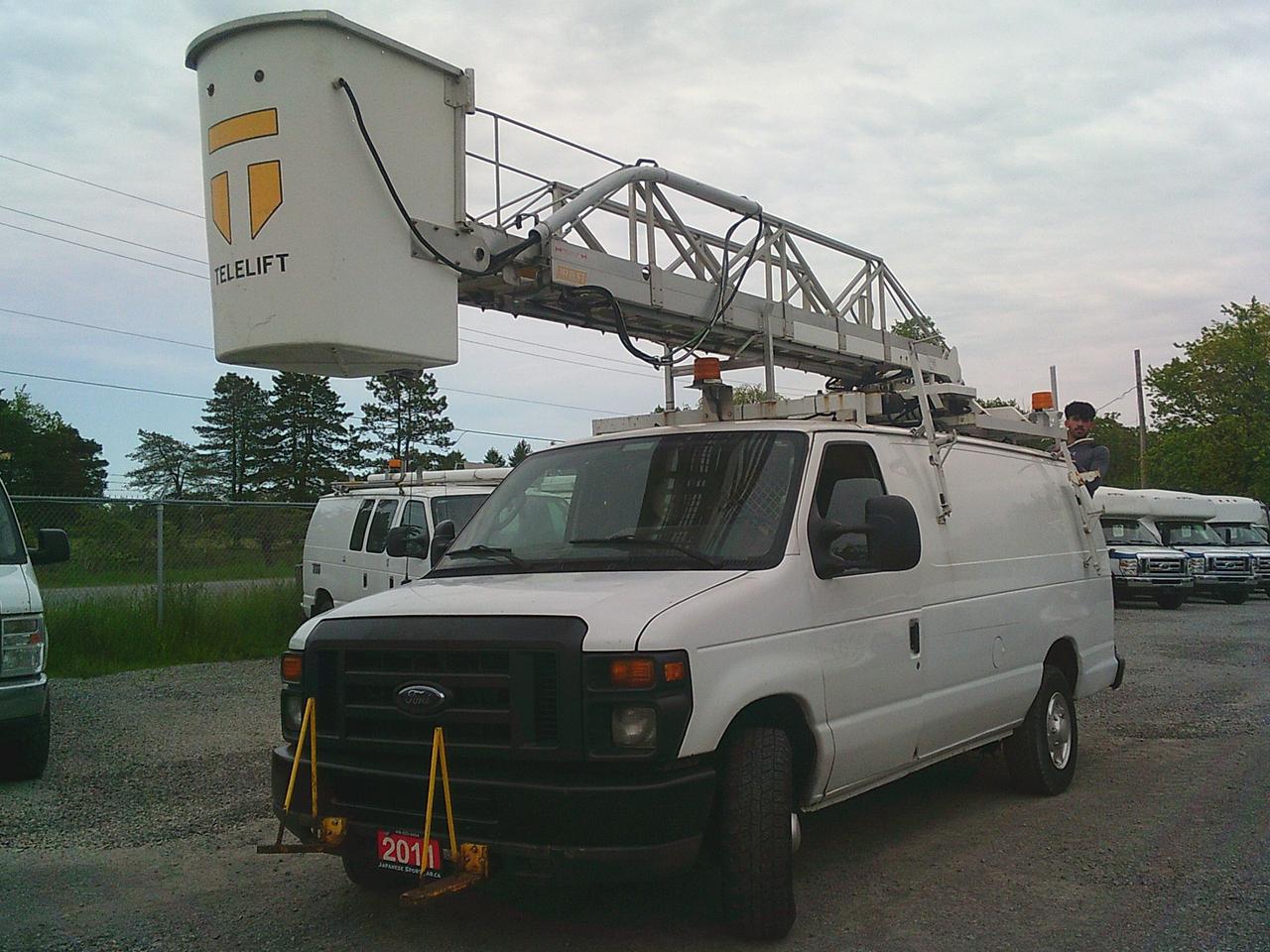 35 FT,, Bucket truck, Clean car fax, Safety. ONLY 2 Previous Owners! OVER 40 Service Records! Trades are welcome. Need financing? No problem, we deal with many financial companies that can help buyers finance the vehicle they want! Any credit welcome. We now offer FREE vehicle delivery anywhere in the Niagara Region! Buy Ahead And Pickup From Our Location Or Have It Shipped Directly To Your Door! Ask Us Today! Japanese Sport Car has been serving Canadians for over 27 years, and we strive to provide the best service possible to customers all over Canada! BUY WITH CONFIDENCE! OMVIC & UCDA Registered dealer, specializing in Commercial Trucks for over 27 years!

Telelift Height 355"
Reach 268"
Max Capacity 300 lbs
Serial Number 39320711-C

Full vehicle specs & features
2011 Ford Econoline Cargo Van E350
Trim 
COMMERCIAL
Powertrain 
Auto, Rear Wheel Drive, 5.4L 8cyl, Flex Fuel
Odometer 
225XXX KM
Exterior/interior colour 
White / Gray
2 Seats 
6 Doors 
VIN :1FTSS3EL8BDB03850

Sony MP3/Bluetooth/CD/Radio/AUX
Reverse Camera
Air Type: Air Conditioning
Seat Covering Type: Cloth
Adjustable Steering Wheel
Power Steering
Radio Equipment: AM/FM/Cassette
Traction Control
Roof Type: Hard Top
ABS
Seat Type - Bucket

We offer a comprehensive Client Care Package for only $799 which includes a certified safety inspection. All prices do not include certification, applicable taxes (HST) and licensing fees. Without certification, as per OMVIC regulations, the vehicle is not road worthy or certified.