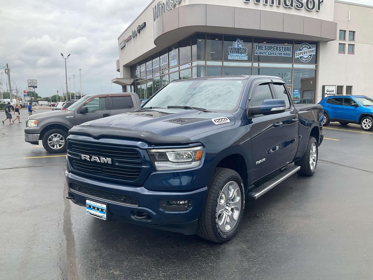 Odometer is 12090 kilometers below market average! Recent Arrival!

Patriot Blue Pearlcoat 2020 Ram 1500 Big Horn/Lone Star 4WD 8-Speed Automatic HEMI 5.7L V8 VVT

**CARPROOF CERTIFIED**.

* PLEASE SEE OUR MAIN WEBSITE FOR MORE PICTURES AND CARFAX REPORTS * Buy in confidence at WINDSOR CHRYSLER with our 95-point safety inspection by our certified technicians. Searching for your upgrade has never been easier. You will immediately get the low market price based on our market research, which means no more wasted time shopping around for the best price, Its time to drive home the most car for your money today. OVER 100 Pre-Owned Vehicles in Stock! Our Finance Team will secure the Best Interest Rate from one of out 20 Auto Financing Lenders that can get you APPROVED! Financing Available For All Credit Types! Whether you have Great Credit, No Credit, Slow Credit, Bad Credit, Been Bankrupt, On Disability, Or on a Pension, we have options. Looking to just sell your vehicle? We buy all makes and models let us buy your vehicle. Proudly Serving Windsor, Essex, Leamington, Kingsville, Belle River, LaSalle, Amherstburg, Tecumseh, Lakeshore, Strathroy, Stratford, Leamington, Tilbury, Essex, St. Thomas, Waterloo, Wallaceburg, St. Clair Beach, Puce, Riverside, London, Chatham, Kitchener, Guelph, Goderich, Brantford, St. Catherines, Milton, Mississauga, Toronto, Hamilton, Oakville, Barrie, Scarborough, and the GTA.