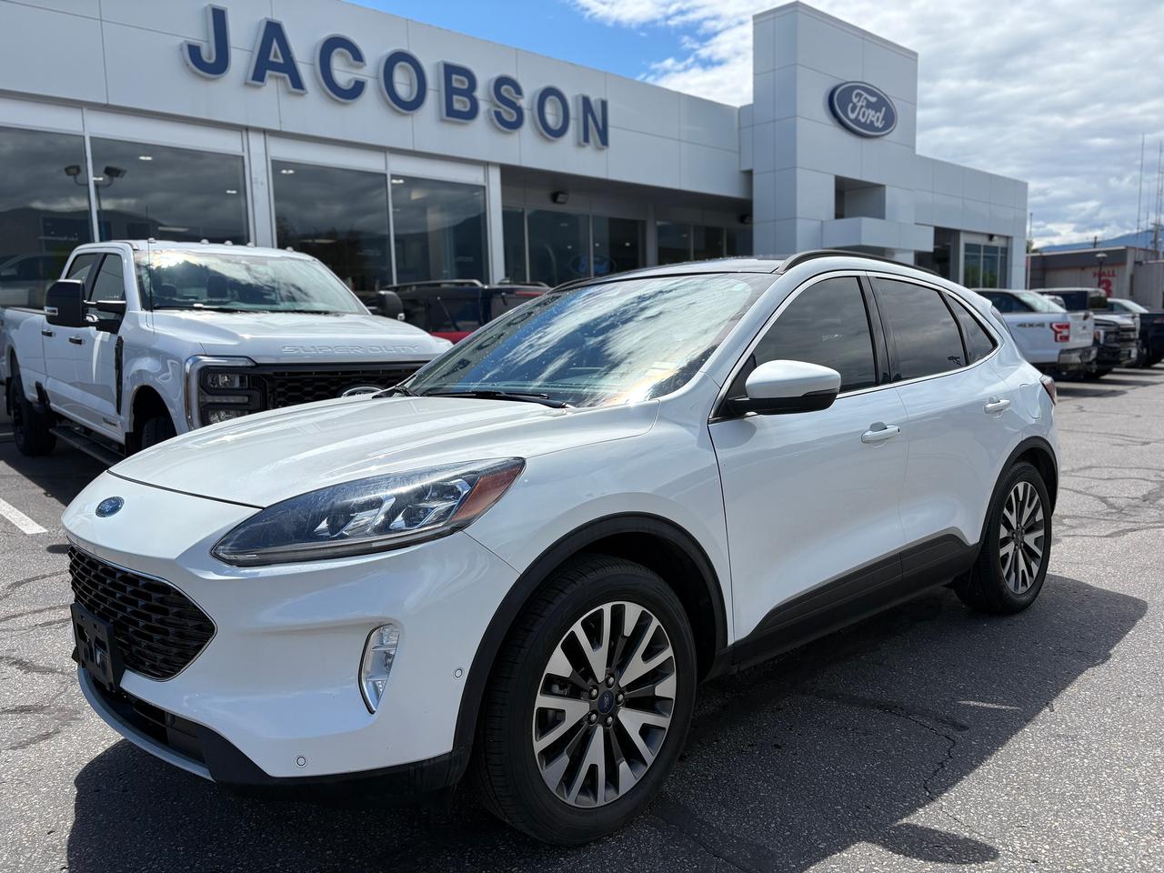 <p>This Escape Titanium is loaded with extra comfort and features for the price. Top features include all-wheel drive, a power liftgate, a wireless charging pad, navigation with voice activation, a heated leather steering wheel, adaptive cruise control, a Class II trailer tow package, and 19-inch alloy wheels. The navigation and wireless charging keep road trips simple, while the adaptive cruise control and tow package make it just as easy to haul gear for a weekend away. This escape is ready for everything from daily errands to weekend road trips through the mountains. Come in today for a test drive.</p>