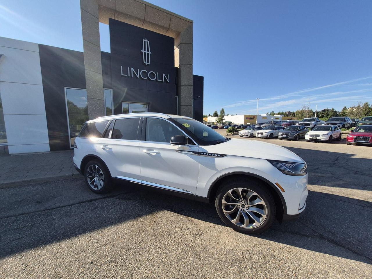 <p>Experience the pinnacle of automotive luxury and innovation with the brand new 2026 Lincoln Aviator RESERVE, now available at Expressway Motors Ltd. This stunning SUV, cloaked in a sophisticated Pristine White Metallic Tri-Coat exterior, is designed to elevate every journey. Step inside to discover an inviting Onyx interior, crafted with Premium Leather seating that offers both heating and ventilation for ultimate comfort, ensuring you and your passengers are perfectly poised, no matter the season. Beneath the hood lies a powerful 3L 6-cylinder engine, paired with an all-wheel-drive system, promising a dynamic and confident driving experience on any road, in any condition.</p><p>The 2026 Lincoln Aviator RESERVE redefines what it means to drive. Its spacious 4-door SUV/Crossover body style provides ample room for both cargo and passengers, making it the ideal companion for family adventures or sophisticated city cruising. The automatic transmission ensures seamless gear changes, while the premium gasoline engine delivers exhilarating performance with impressive efficiency. At Expressway Motors Ltd., we are proud to offer this exceptional new vehicle that blends cutting-edge technology with unparalleled craftsmanship, creating a driving sanctuary thats as beautiful as it is functional.</p><p>Here are 5 of the most captivating features of this 2026 Lincoln Aviator RESERVE:</p><ul><li><strong>Panoramic Vista Roof:</strong> Immerse yourself in the open sky and enjoy breathtaking views with the expansive panoramic roof, bathing the cabin in natural light and creating an airy, spacious ambiance.</li><li><strong>Phone As A Key:</strong> Leave your keys behind and unlock a new level of convenience. Use your smartphone to seamlessly access and start your Aviator, offering a modern and secure way to manage your vehicle.</li><li><strong>360-Degree Camera System:</strong> Navigate tight spots and parking lots with absolute confidence. This intelligent system provides an unobstructed, birds-eye view of your surroundings, making every maneuver effortless.</li><li><strong>Premium Leather Heated/Ventilated Front Captains Seats:</strong> Sink into unparalleled comfort with meticulously crafted Onyx leather seats that offer customizable heating and ventilation, ensuring youre always at the perfect temperature.</li><li><strong>Pristine White Metallic Tri-Coat Exterior:</strong> Turn heads with a dazzling and sophisticated exterior finish that exudes elegance and modern refinement, making a bold statement wherever you go.</li></ul><p><strong><em>Powered by AutoIntelligence&trade;</em></strong></p><p>Vehicle information has been generated using artificial intelligence and is provided for informational purposes only. While efforts are made to ensure accuracy, please confirm all details directly with the dealer.</p><p class=MsoNormal style=margin: 0cm 0cm 8pt; line-height: 13.8pt; font-size: 12pt; font-family: Aptos, sans-serif;><strong><span style=font-family: Calibri, sans-serif;>2 locations to better serve YOU! &ndash; Stratford and New Hamburg</span></strong></p><p>&nbsp;</p><p class=MsoNormal style=margin: 0cm 0cm 8pt; line-height: 13.8pt; font-size: 12pt; font-family: Aptos, sans-serif;><strong><span style=font-family: Calibri, sans-serif;>New or Pre-Owned vehicles are shared between both locations &ndash; please contact Sales to confirm.</span></strong></p><p>&nbsp;</p><p class=MsoNormal style=margin: 0cm 0cm 8pt; line-height: 13.8pt; font-size: 12pt; font-family: Aptos, sans-serif;><span style=font-family: Calibri, sans-serif;>Purchasing a new vehicle from&nbsp;<strong>Expressway&nbsp;</strong>is a decision that you will be able to make with confidence knowing that you&rsquo;re getting the most that a vehicle and dealership can offer to you.</span></p><p>&nbsp;</p><p class=MsoNormal style=margin: 0cm 0cm 8pt; line-height: 13.8pt; font-size: 12pt; font-family: Aptos, sans-serif;><strong><span style=font-family: Calibri, sans-serif;>Warranty:</span></strong><span style=font-family: Calibri, sans-serif;>&nbsp;We offer best in class Extended Protection options with flexible terms that can be tailored to your needs at a price that you can afford.</span></p><p>&nbsp;</p><p class=MsoNormal style=margin: 0cm 0cm 8pt; line-height: 13.8pt; font-size: 12pt; font-family: Aptos, sans-serif;><strong><span style=font-family: Calibri, sans-serif;>Finance:</span></strong><span style=font-family: Calibri, sans-serif;>&nbsp;At Expressway we have some of the best Finance Managers in the business that work with all the Major banks and Core Lenders. The Relationships we have built will help guarantee that you get the lowest rate possible</span></p><p>&nbsp;</p><p class=MsoNormal style=margin: 0cm 0cm 8pt; line-height: 13.8pt; font-size: 12pt; font-family: Aptos, sans-serif;><span style=font-family: Calibri, sans-serif;>Check out our great selection of vehicles at Expressway in New Hamburg and Stratford Locations!</span></p><p>&nbsp;</p><p class=MsoNormal style=margin: 0cm 0cm 8pt; line-height: 13.8pt; font-size: 12pt; font-family: Aptos, sans-serif;><strong><span style=font-family: Calibri, sans-serif;>Call Expressway for your quote today!</span></strong></p><p>&nbsp;</p><p class=MsoNormal style=margin: 0cm 0cm 8pt; line-height: 13.8pt; font-size: 12pt; font-family: Aptos, sans-serif;><strong><span style=font-family: Calibri, sans-serif;>New Hamburg:</span></strong><span style=font-family: Calibri, sans-serif;>&nbsp;<a href=tel:+15196623900><span style=color: #0563c1;>519*662*3900</span></a></span></p><p>&nbsp;</p><p class=MsoNormal style=margin: 0cm 0cm 8pt; line-height: 13.8pt; font-size: 12pt; font-family: Aptos, sans-serif;><strong><span style=font-family: Calibri, sans-serif;>Stratford</span></strong><span style=font-family: Calibri, sans-serif;>:&nbsp;<a href=tel:+15192713900><span style=color: #0563c1;>519*271*3900</span></a></span></p><p>&nbsp;</p><p class=MsoNormal style=margin: 0cm 0cm 8pt; line-height: 13.8pt; font-size: 12pt; font-family: Aptos, sans-serif;><span style=font-family: Calibri, sans-serif;>or visit us online at:&nbsp;&nbsp;<a href=https://www.expresswayford.com/ target=_blank rel=noopener><span style=color: #0563c1;>www. expresswayford .com</span></a>&nbsp;or&nbsp;<a href=https://www.expresswaylincoln.ca/ target=_blank rel=noopener><span style=color: #0563c1;>www. expresswaylincoln .ca</span></a></span></p><p>&nbsp;</p><p class=MsoNormal style=margin: 0cm 0cm 8pt; line-height: 13.8pt; font-size: 12pt; font-family: Aptos, sans-serif;><strong><span style=font-family: Calibri, sans-serif;>We pride ourselves in No Hassle, No Pressure, Honest Service. We practice full disclosure with all our used vehicles and have a Better Business Bureau A+ rating!</span></strong></p><p>&nbsp;</p><p class=MsoNormal style=margin: 0cm 0cm 8pt; line-height: 13.8pt; font-size: 12pt; font-family: Aptos, sans-serif;><span style=font-size: 8pt; font-family: Calibri, sans-serif;>**Expressway reserves the right to correct any errors and omissions that occur on this site. (Incl, but not limited to price, incl. Event price rollbacks, vehicles features & more).</span></p><p>&nbsp;</p><p class=MsoNormal style=margin: 0cm 0cm 8pt; line-height: 13.8pt; font-size: 12pt; font-family: Aptos, sans-serif;><span style=font-size: 8pt; font-family: Calibri, sans-serif;>** Expressway is a Fair Market Price Dealership pricing subject to change with current market conditions</span></p>