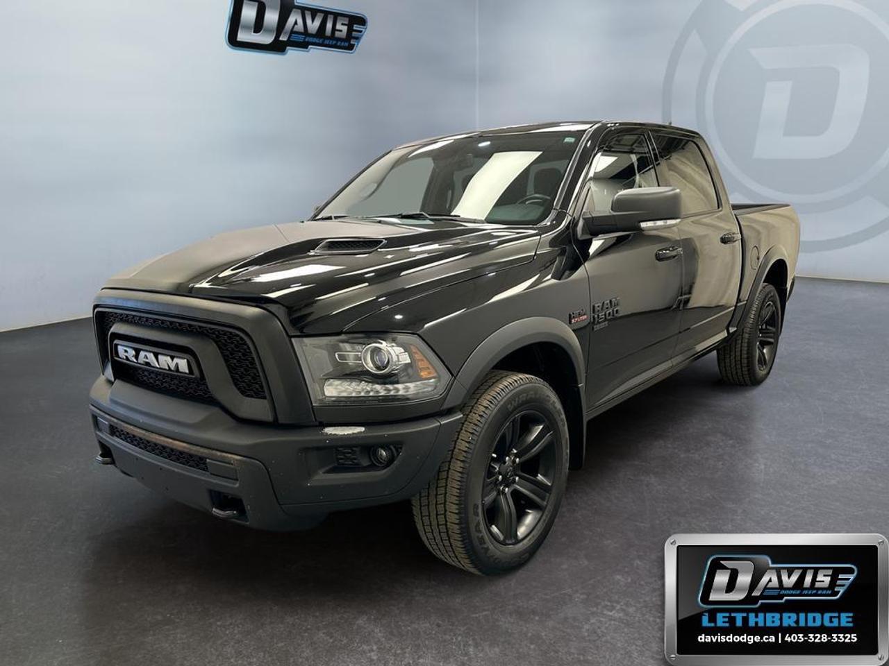 <b>Aluminum Wheels, Remote Keyless Entry, Fog Lamps, Climate Control, Rear Camera!</b><br /> <br /> This 2022 Ram 1500 Classic is the truck to have, thanks to its incredible powertrain and a well-appointed interior. This 2022 Ram 1500 Classic is for sale today in Lethbridge.<br /> <br />The reasons why this Ram 1500 Classic stands above its well-respected competition are evident: uncompromising capability, proven commitment to safety and security, and state-of-the-art technology. From its muscular exterior to the well-trimmed interior, this 2022 Ram 1500 Classic is more than just a workhorse. Get the job done in comfort and style while getting a great value with this amazing full size truck.<br /> <br />This Crew Cab 4X4 pickup has 60,033 km. Stock number 41579 is Black in colour. It has an Automatic transmission and is powered by a 395HP 5.7L 8 Cylinder Engine. <br /> <br /> Our 1500 Classic's trim level is Warlock. This gothic looking Ram 1500 Classic Warlock is an awesome truck that comes with black aluminum wheels and dark exterior accents, front fog lamps, powder-coated front and rear bumpers, a touchscreen infotainment system that features wireless streaming audio and SiriusXM radio. This limited-edition truck also comes with a lift kit and heavy-duty shock absorbers, electronic stability plus trailer sway control, remote keyless entry, a ParkView rear back-up camera, cruise control, automatic headlights, and much more. This vehicle has been upgraded with the following features: Aluminum Wheels, Remote Keyless Entry, Fog Lamps, Climate Control, Rear Camera, Touchscreen, SiriusXM.<br /> <br />To apply right now for financing use this link: <a href=https://lethbridge.davisdodge.ca/free-credit-check/ target=_blank rel=nofollow noopener noreferrer>https://lethbridge.davisdodge.ca/free-credit-check/</a><br /> <br /><br />Locally Owned & Trusted for Over 35 Years  Davis Dodge in Lethbridge, AB <br /><br /> At Davis Dodge, weve proudly served the Lethbridge community for more than 35 years, offering an unparalleled car buying experience. Dont just take our word for itour Google reviews speak volumes about our commitment to exceptional service. <br /><br /> Delivery & At-Home Test Drives: Convenient options to suit your lifestyle. <br /><br /> Flexible Financing for Everyone: Get the vehicle you need with financing solutions tailored to your situation. <br /><br /> Full Mechanical Inspections & Professional Cleaning: Every vehicle is thoroughly inspected and cleaned before it hits our lot.<br /><br /> We take all makes and models on trade and offer competitive pricing with inventory that changes daily. Whether you're shopping for a Chrysler, Dodge, Jeep, RAM, or FIAT, our AMVIC Licensed dealership makes it easy to browse, buy, and drive away.<br /><br /> Located in Lethbridge, AB, we proudly serve customers in Fort Macleod, Taber, Claresholm, and Coaldale. Shop online or visit us today to experience the best in sales, service, and selection. Standard bank rates apply; taxes are additional.<br /><br /> Vehicle pricing offer shown expires 2026-07-31. <br /> Come by and check out our fleet of 50+ used cars and trucks and 100+ new cars and trucks for sale in Lethbridge. o~o