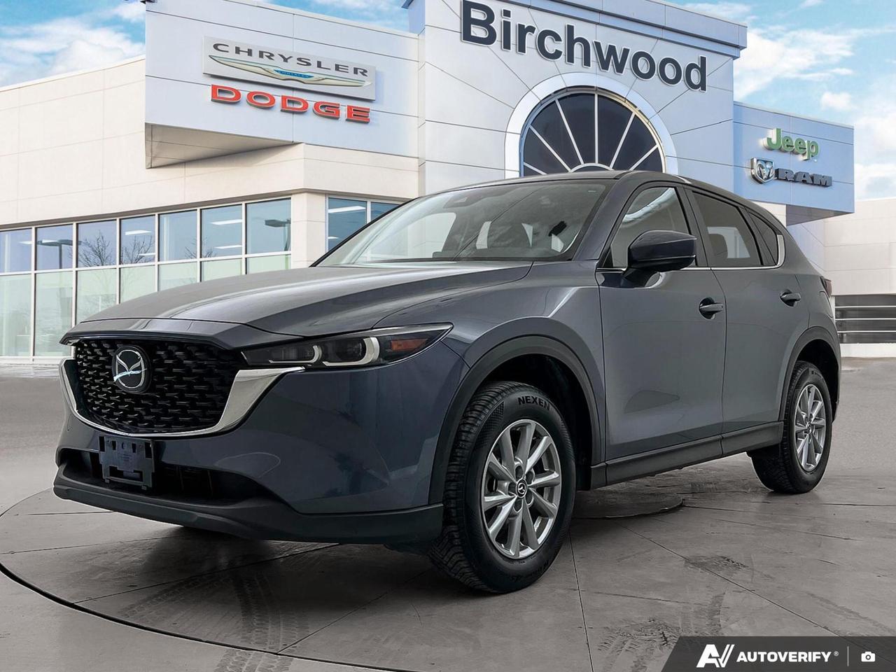 If youre looking for a capable, well-equipped compact SUV that balances everyday practicality with genuine driving confidence, this 2025 Mazda CX-5 GS in striking Machine Grey Metallic delivers. With just over 54,000 km on the clock and a strong suite of driver-assist technology, its ready to handle Manitoba roads in any season.

Key Features:
- AWD with 6-Speed SKYACTIV Automatic transmission including Sport/Off-Road drive modes
- Mazda Radar Cruise Control (MRCC) with Stop & Go  ideal for highway commuting
- Advanced Blind Spot Monitoring and Rear Cross Traffic Alert for confident lane changes
- Dual-Zone Front Automatic Air Conditioning for personalized cabin comfort
- Heated Leatherette Steering Wheel and Leatherette-accented front bucket seats
- Auto LED projector headlamps with automatic high-beam and daytime running lights
- Collision Mitigation (Front) and full airbag suite including curtain and side airbags
- Rain-sensing wipers with heated wiper park  a practical touch for year-round driving

No reported accidents on this vehicle, giving you added peace of mind with your purchase.

At Birchwood Chrysler Dodge Jeep Ram, were committed to making your car-buying experience straightforward and stress-free. Visit us in person, browse at birchwoodchrysler.ca, or contact us today to book your test drive. Were happy to answer any questions and help you explore your financing options.
With us, Experience is Everything. Complete as much or as little of your purchase online as you like. All pricing is what you see is what you pay. No hidden fees. On our website you can choose payment options and terms knowing these are transparent and accurate.

Start your purchase online to build your exact pricing to your specifics like how much money down, vehicle trade and any accessories or added optional protection that suits your needs.

Any questions let us know by calling (204) 774-4444, wed love to send you a video to clarify any questions about a vehicle!

Visit us in store at 90-3965 Portage Ave in the Birchwood Autopark.

Dealer permit #5686
Dealer permit #5686