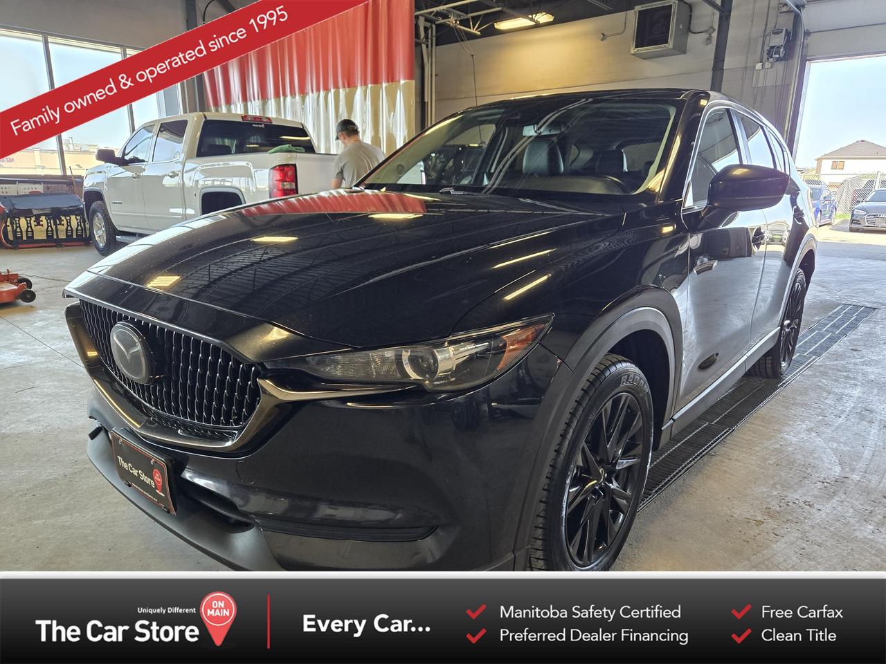 2021.5 Mazda CX-5 GS Kuro Edition  No Accidents | New Tires | New Brakes 
 Key Features: 
 All-Wheel Drive 
 GS Kuro Edition 
 Genuine Leather Seating 
 Power Drivers Seat with Memory 
 Black Exterior Accents & Black Chrome Fascia 
 2021.5 Mid-Year Update with Larger Infotainment Screen 
 Mazda Connected Services & Smartphone App Integration 
 Apple CarPlay & Android Auto 
 Comfort: Heated Front Seats & Heated Steering Wheel 
 Driver Assistance: Blind-Spot Monitoring & Rear Cross-Traffic Alert 
 No Accidents 
 Brand New Tires, Brand New Brakes 
 New Battery 
 
 
 A More Desirable Version of the CX-5: 
 The 2021.5 models received meaningful updates, most notably the larger infotainment display and access to Mazda Connected Services. These improvements make the vehicle feel noticeably more modern than earlier 2021 examples. 
 
 
 Kuro Edition Done Right: 
 The Kuro package adds more than just appearance upgrades. Genuine leather seating, memory seating, and unique blacked-out exterior details give it a more premium feel while maintaining the CX-5s reputation for excellent fit and finish. 
 
 
 Recently Reconditioned and Ready to Go: 
 With brand new tires, brakes, and battery already taken care of, the major maintenance items have been addressed. Combined with a clean accident history, its a stand out in the compact SUV market. 
 
 
 Our Take: 
 The CX-5 is already one of the strongest vehicles in its segment, and the 2021.5 Kuro Edition is one of the better versions to own. The updated technology, premium touches, and recent maintenance make this a particularly well-rounded example. 
 
 
 We are a local Family Owned business and we try to do things a little different. 
 
 At The Car Store on Main every vehicle is Manitoba Safety Certified. 
 Every vehicle sold is eligible for the Advantage Plan: 
 30 Day Warranty on all MB Safety certificate related items. 
 CarFax Vehicle History Report 
 2 sets of Keys 
 Wholesale access to all other Miscellaneous Accessories (i.e. Wtr Tires, Remote Starr, all misc vehicle accessories/parts, etc...) 
 And of course a Full tank of Gas. 
 
 There is no Gimmicks or games, we are always aggressive on our prices and try to separate ourselves from the rest. 
 We also have an on-site Certified Banker who shops to get the best possible interest rates in with all Major Banks and Credit Unions! 
 
 Come to our Brand New modern showroom and see what makes us Uniquely Different! 
 
 Located on Main St. just North of Chief Peguis Trail. 
 
 To schedule an appointment call us directly at 204-669-1248 or email sales@thecarstore.ca 
 
 The Car Store on Main 
 -Uniquely Different- 
 
 www.thecarstore.ca 
 Local: 204-669-1248 
 Toll Free: 877-634-2975 
 
 A local family owned business unlike typical car lots, there are no pressure tactics, no games, no gimmicks, no Sales Manager, General Manager or Used Car Manager, just straight answers and fair deals all the time! 
 
 *PRICE DOES NOT INCLUDE TAXES (G.S.T & P.S.T) 
 Dealer Permit # 4481