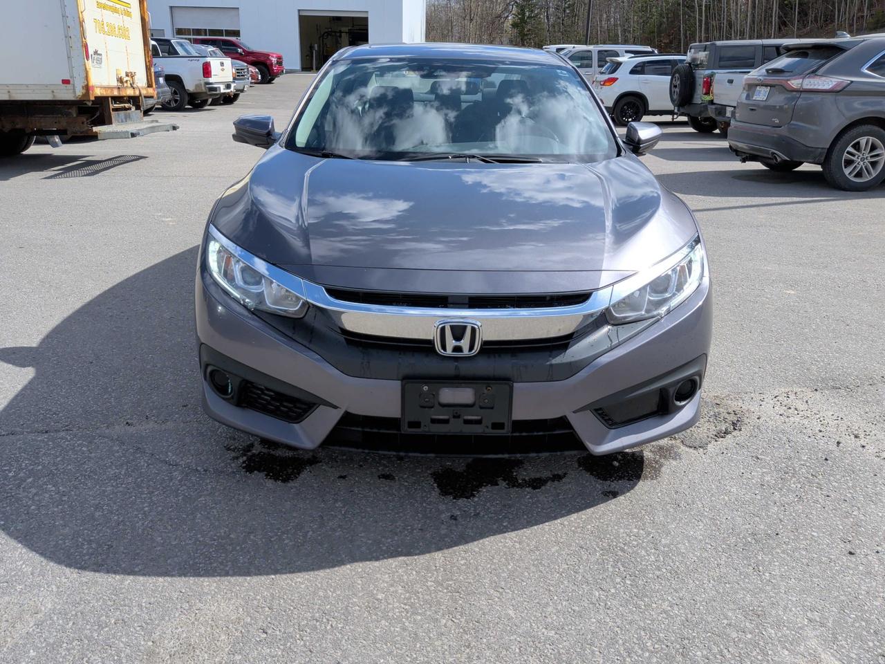 Great Condition, Accident Free Honda Civic EX with Dealer Service History! Equipped with a Sunroof, Power Seats, LaneWatch Camera, Smart Key with Push Button Start, Alloy Wheels, Apple Car Play, Android Auto, Honda Sensing Package ( Collision Mitigation Braking System, Forward Collision Warning, Lane Keeping Assist System, Road Departure Mitigation, Lane Departure Warning, Adaptive Cruise Control with Low Speed Follow), Power Group