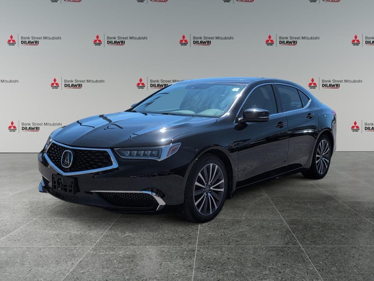 Balance of 5 year/100,000kms BASIC warranty and 10 year/160,000kms Factory Powertrain Warranty on ALL MITSUBISHI products! Best in the industry!!!! Introducing the 2018 Acura TLX SH-AWD Tech Sedan, a stunning sedan adorned in a sophisticated hue. With its advanced all-wheel-drive system, this vehicle offers exceptional handling and confidence in any driving condition. The exterior boasts elegant alloy wheels, perfectly complementing the refined aesthetic of leather seats that envelop you in luxury. Step inside, and youll find not only comfort with heated front and rear seats but also an array of premium features such as a leather-wrapped steering wheel and a power sunroof that invites natural light into the spacious cabin. For the tech-savvy driver, the Acura TLX comes equipped with a state-of-the-art navigation system, Bluetooth connectivity, smart device integration, and satellite radio for endless entertainment options. Safety and driver convenience are paramount, with features like a backup camera, brake assist, lane assist, and adaptive cruise control meticulously integrated for a smooth driving experience. This vehicle is perfect for those who value performance, luxury, and high-tech amenities in their daily drive. Contact Bank Street Mitsubishi today to schedule a test drive and learn more about this exceptional sedan.