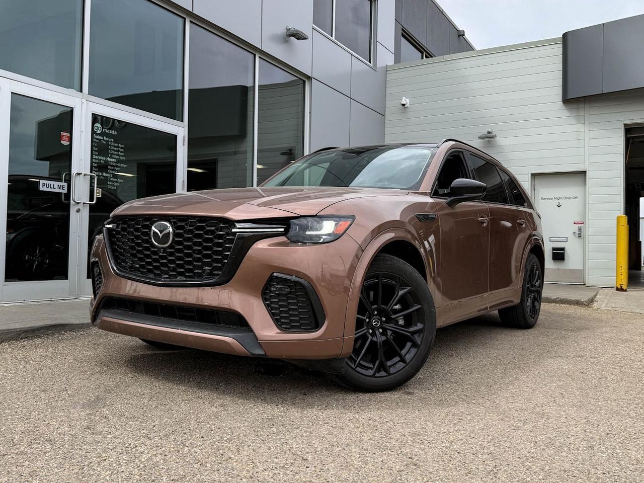 Experience the perfect blend of power, luxury, and technology with this pre-owned 2025 Mazda CX-70 MHEV GT AWD in striking Copper exterior and sleek Black leather interior. Powered by a robust 3.3L e-SKYACTIV-G MHEV I6 turbocharged engine paired with an 8-speed automatic transmission and advanced AWD, this SUV delivers confident performance and efficiency.Step inside to enjoy heated front bucket seats, premium Bose sound, dual-zone climate control, and a driver-centric 10.2 infotainment display with integrated navigation and wireless smart device charging. Safety is paramount with features like lane departure warning, adaptive cruise control, blind-spot monitoring, and a comprehensive airbag system.Whether youre commuting or adventuring, the CX-70 combines sophistication and capability flawlessly. Discover refined comfort, cutting-edge tech, and Mazdas legendary driving dynamics all in one stylish package. Visit us today to test drive this outstanding 2025 Mazda CX-70 MHEV GT AWD!Go Mazda is an AMVIC licensed businessClean CarFax