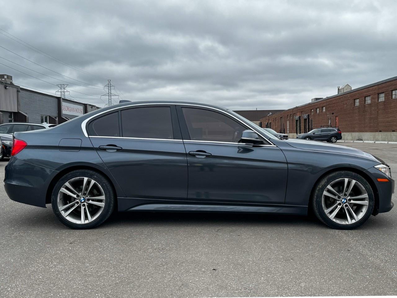 2015 BMW 3 Series 4dr Sdn 328i xDrive AWD Photo