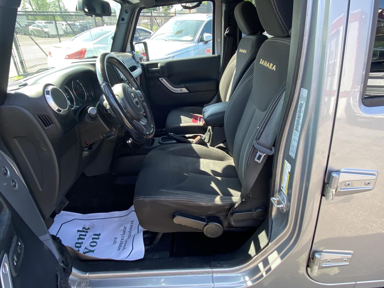 2015 Jeep WRANGLER UNLIMITED 4WD 4dr Sahara Photo