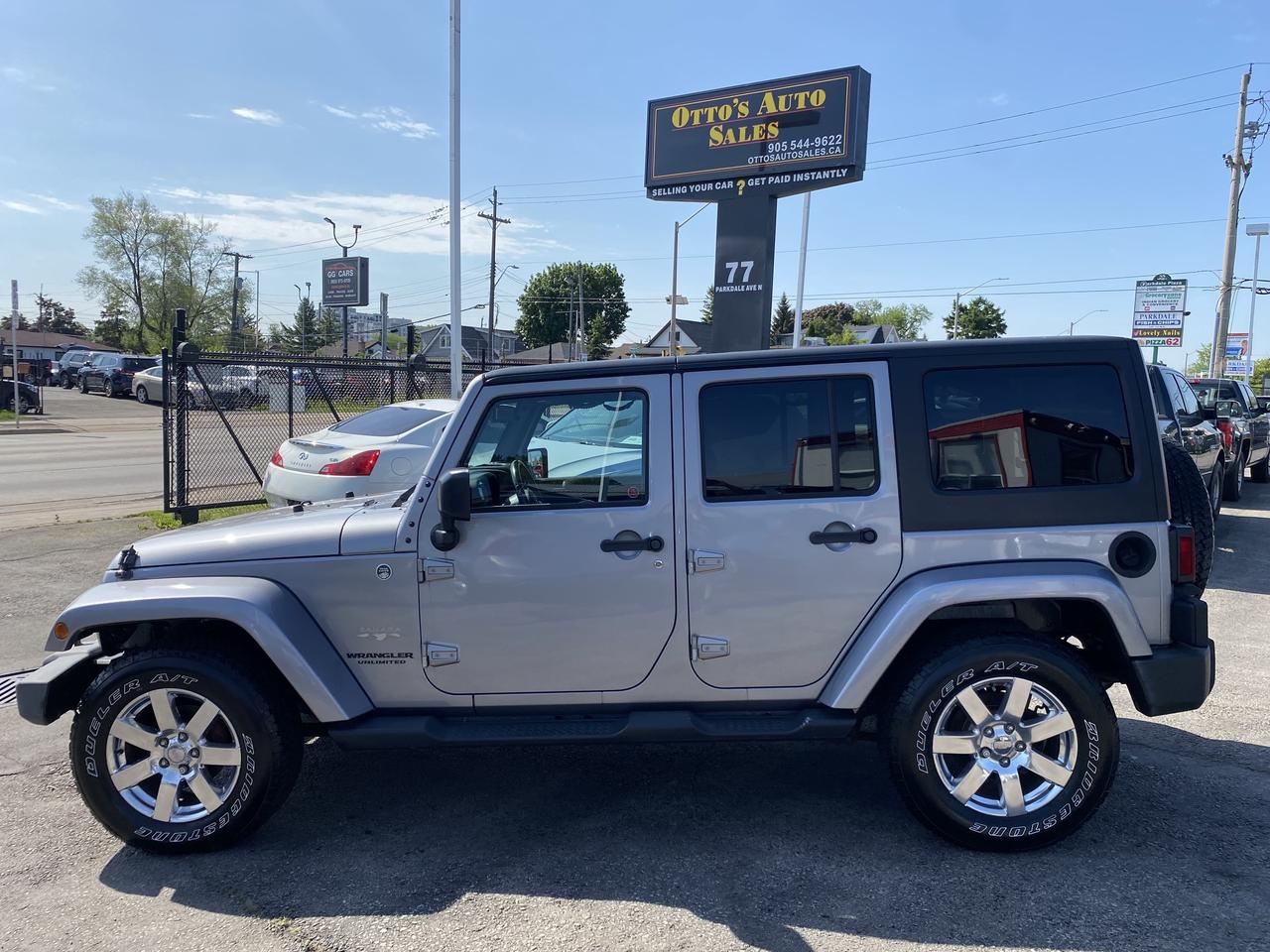 2015 Jeep WRANGLER UNLIMITED 4WD 4dr Sahara Photo