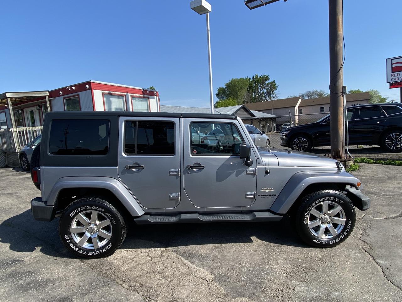 2015 Jeep WRANGLER UNLIMITED 4WD 4dr Sahara Photo