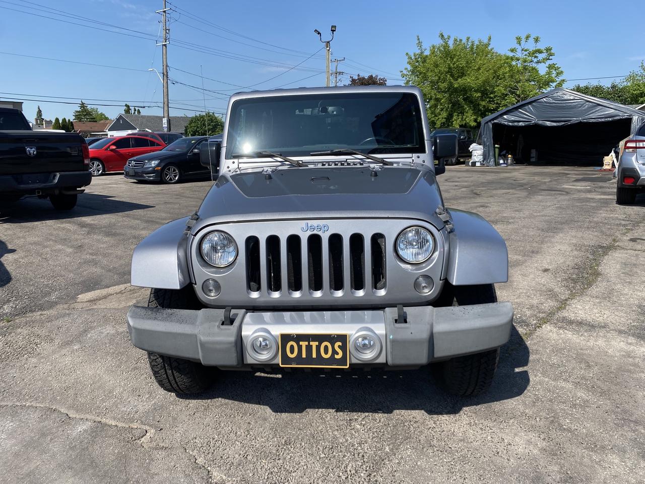 2015 Jeep WRANGLER UNLIMITED 4WD 4dr Sahara Photo