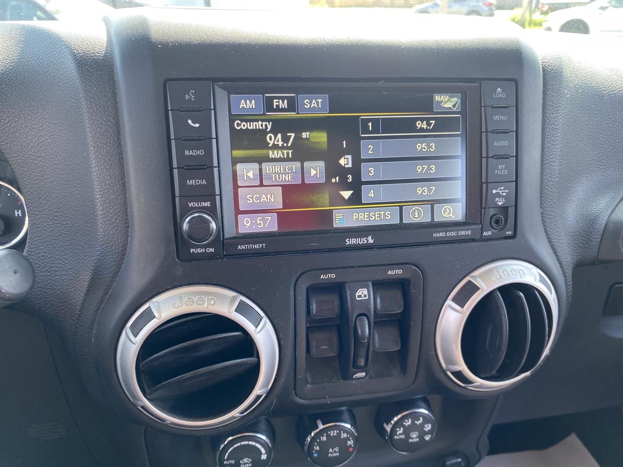 2015 Jeep WRANGLER UNLIMITED 4WD 4dr Sahara Photo
