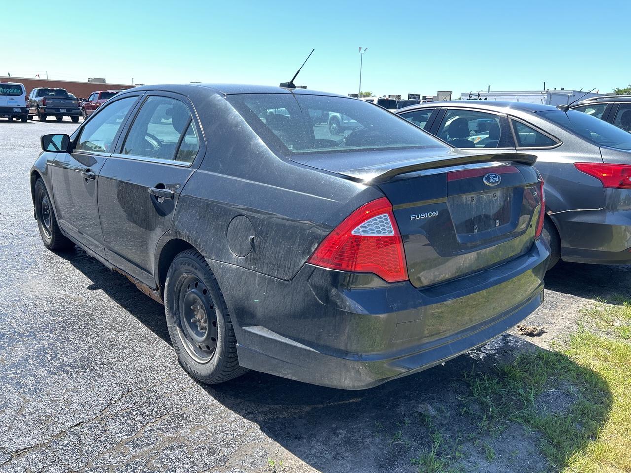 2010 Ford Fusion 2.5L AS- IS 137,000 KMS Photo
