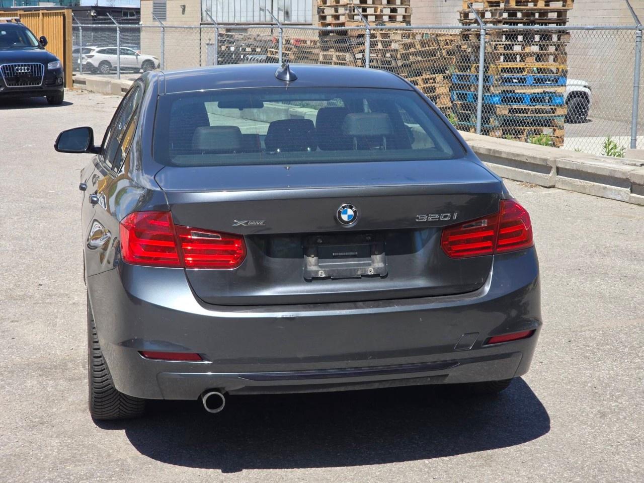 2014 BMW 3 Series 4dr Sdn 320i xDrive AWD Photo