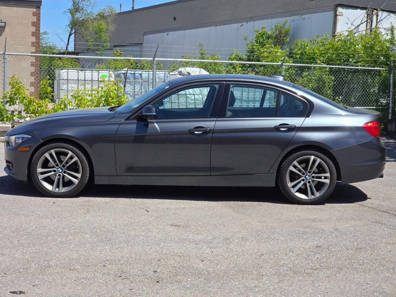 2014 BMW 3 Series 4dr Sdn 320i xDrive AWD Photo