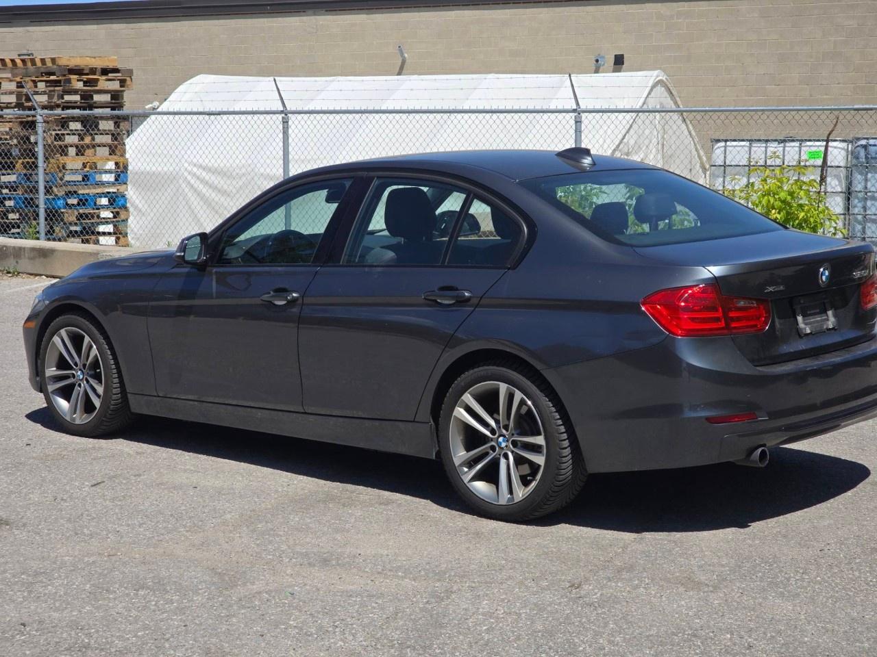 2014 BMW 3 Series 4dr Sdn 320i xDrive AWD Photo