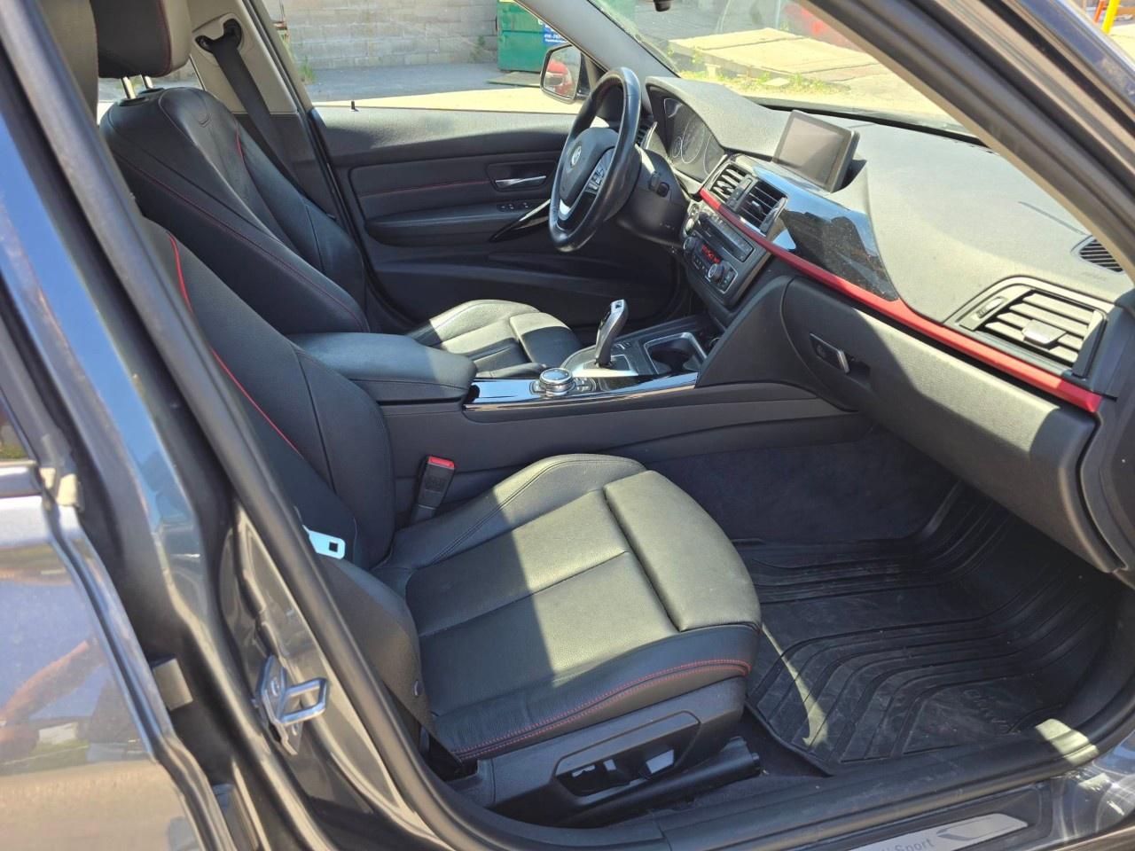 2014 BMW 3 Series 4dr Sdn 320i xDrive AWD Photo