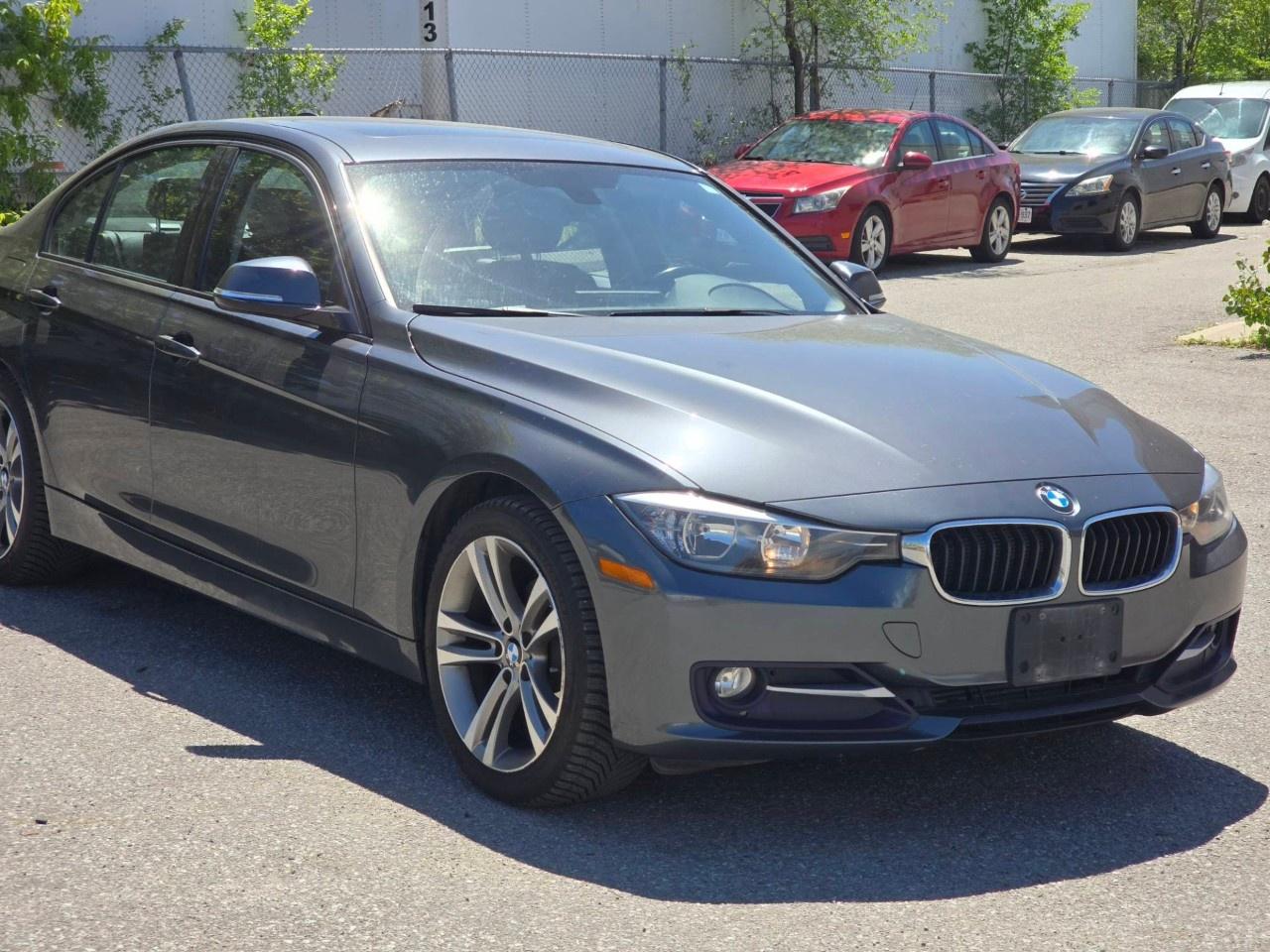 2014 BMW 3 Series 4dr Sdn 320i xDrive AWD Photo