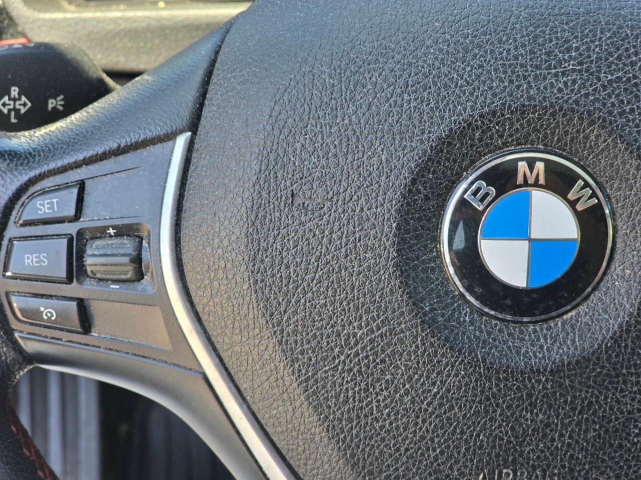 2014 BMW 3 Series 4dr Sdn 320i xDrive AWD Photo