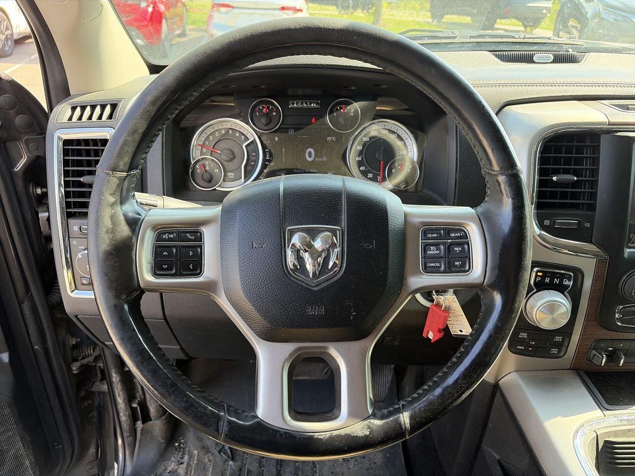 2016 RAM 1500 Laramie V8 HEMI (140.5 WB - 5.7 Box) SOLD AS/IS Photo